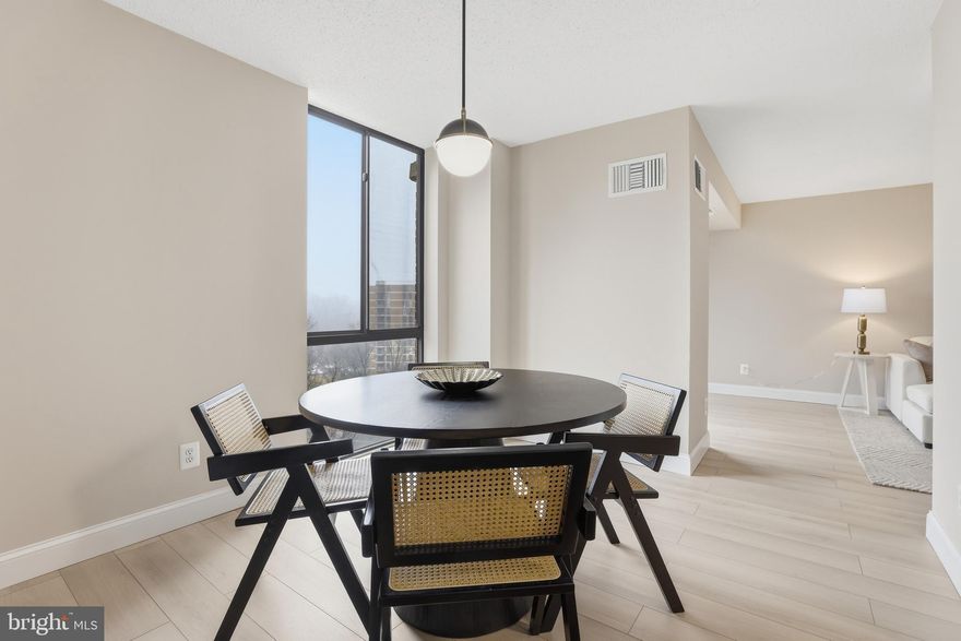 Welcome to Votre Maison!

This stunning condominium has been completely reimagined by Renowned Northern Virginia builder, blending luxurious French-inspired accents with top-tier modern upgrades. From the moment you step inside, you'll notice the impeccable attention to detail: brand-new 7-inch luxury vinyl plank flooring throughout, fresh paint, new molding, new doors, new air vents, and a sleek new thermostat. The spacious living area opens to a large SOUTH-FACING balcony—ideal for soaking up natural light and perfect for feng shui design enthusiasts. Floor-to-ceiling windows and a sliding door flood the home with sunshine, creating a warm and inviting atmosphere.

The chef’s dream kitchen is a showstopper, featuring a stunning quartz island with waterfall edges and a chestnut wood acoustic panel that doubles as a desk or extra seating space for gatherings. You'll find all-new LG ® appliances, including a stove, microwave, refrigerator with water filter, dishwasher, and wine rack. The new cabinets, hardware, light fixtures, and sink with a modern faucet and soap dispenser complete this culinary haven.

Down the hallway, you'll find a brand-new washer and dryer, leading to a fully renovated spa-like bathroom that offers a true retreat. The generously sized bedroom is designed for comfort and can easily accommodate a king-sized bed.

This move-in-ready condominium also comes with an impressive list of amenities: a swimming pool, fitness center, tennis courts, party room, and much more. The $829.10 monthly condo fee includes water, electricity, and gas, and residents enjoy the convenience of a parking decal, additional storage (A- 531), and a secured FOB entry system with 24/7 concierge service for peace of mind.

Centrally located, this property offers unbeatable access to the best of Northern Virginia and the D.C. metro area. It's just 10 minutes from the West Falls Church Metro Station, 5 minutes to Trader Joe’s, and 4 minutes to Starbucks, with nearby EV charging stations and countless dining and shopping options, including Tysons, Mosaic District, and Arlington.

This condominium isn't just a home—it’s a lifestyle upgrade waiting for you!