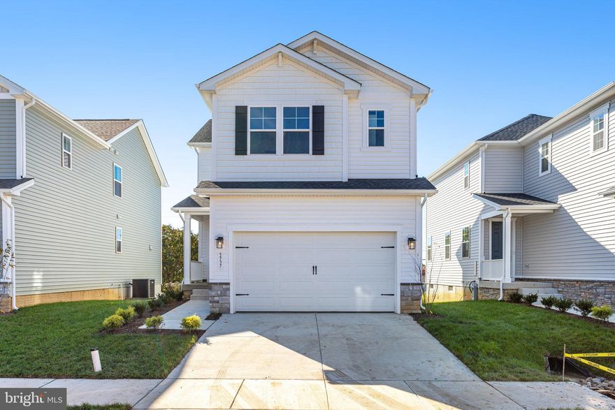 MOVE INTO THIS BRAND-NEW HOME IN 30 DAYS OR LESS!  This brand-new 3-bedroom, 3 1/2 bath Lana by Richmond American Homes. The main floor of this charming Lana plan offers an inviting great room with Mohawk luxury vinyl plank floors on the main level, 9' ceilings with 8' doors, a powder room, and a gourmet kitchen with a convenient island, quartz countertops, backsplash, pantry with wood shelves.  Upstairs, you’ll find three elegant bedrooms, including an impressive primary suite showcasing a roomy walk-in closet and a deluxe bath with double sinks. A secondary bath, top floor laundry, 2-garage with EV charging station, video doorbell, smart locks, smart thermostat for energy efficiency, sidewalks throughout the community, and last but not least a finished basement with 9' ceilings, rough-in for a wet bar with a full bathroom complete this home. Enclave at Arundel Hills is an exciting new community in Glen Burnie. It offers easy access to major employers in Baltimore, Annapolis, and Washington D.C. via I-695 and I-97 and is located just minutes from Fort Meade. Residents can also appreciate close proximity to BWI, countless dining options and minutes to waterfront restaurants, and entertainment options. Choose from an attractive array of single-family homes, each boasting the designer details and in-demand features today’s homebuyers are seeking! Model is OPEN but visitors are encouraged to call ahead to be guaranteed a dedicated appointment.