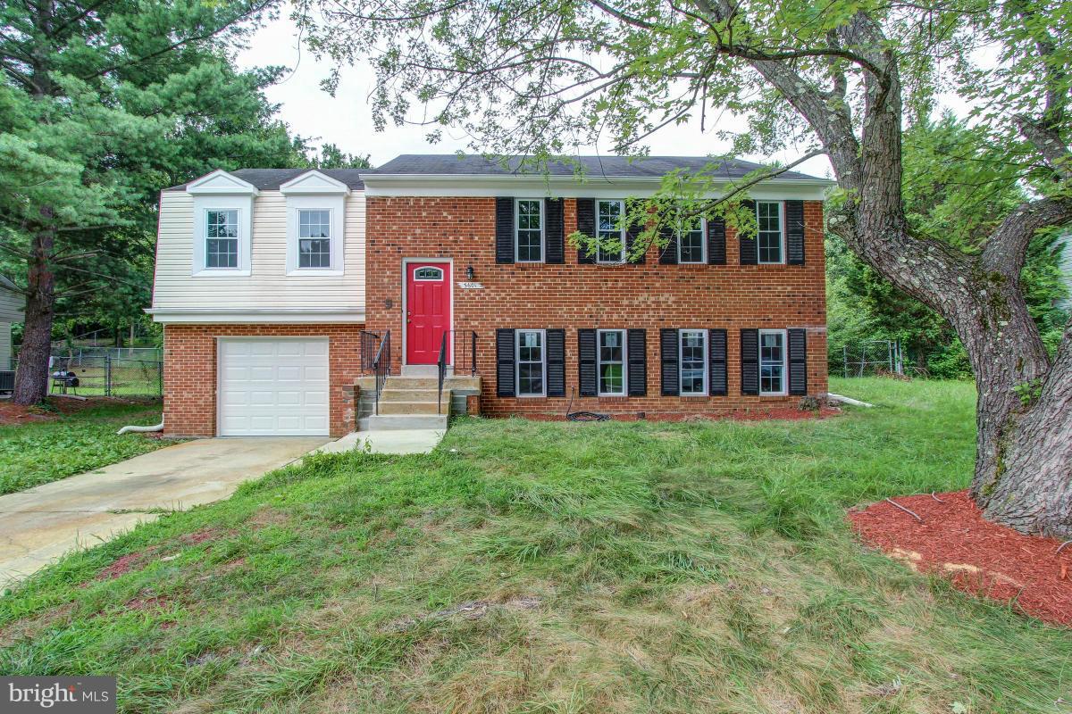 **A MUST SEE*** Custom Paints and baths***Hardwood floors throughout main,open floor plan and kitchen with granite counter top, island, huge deck, new windows, new HVAC, new roof, ALL whirlpool stainless steel appliances, new garage door with 2 remote control, front load washer/dryer, lovely yard.....Tell your agent to bring contract to the viewing..THIS WILL NOT LAST!!!!