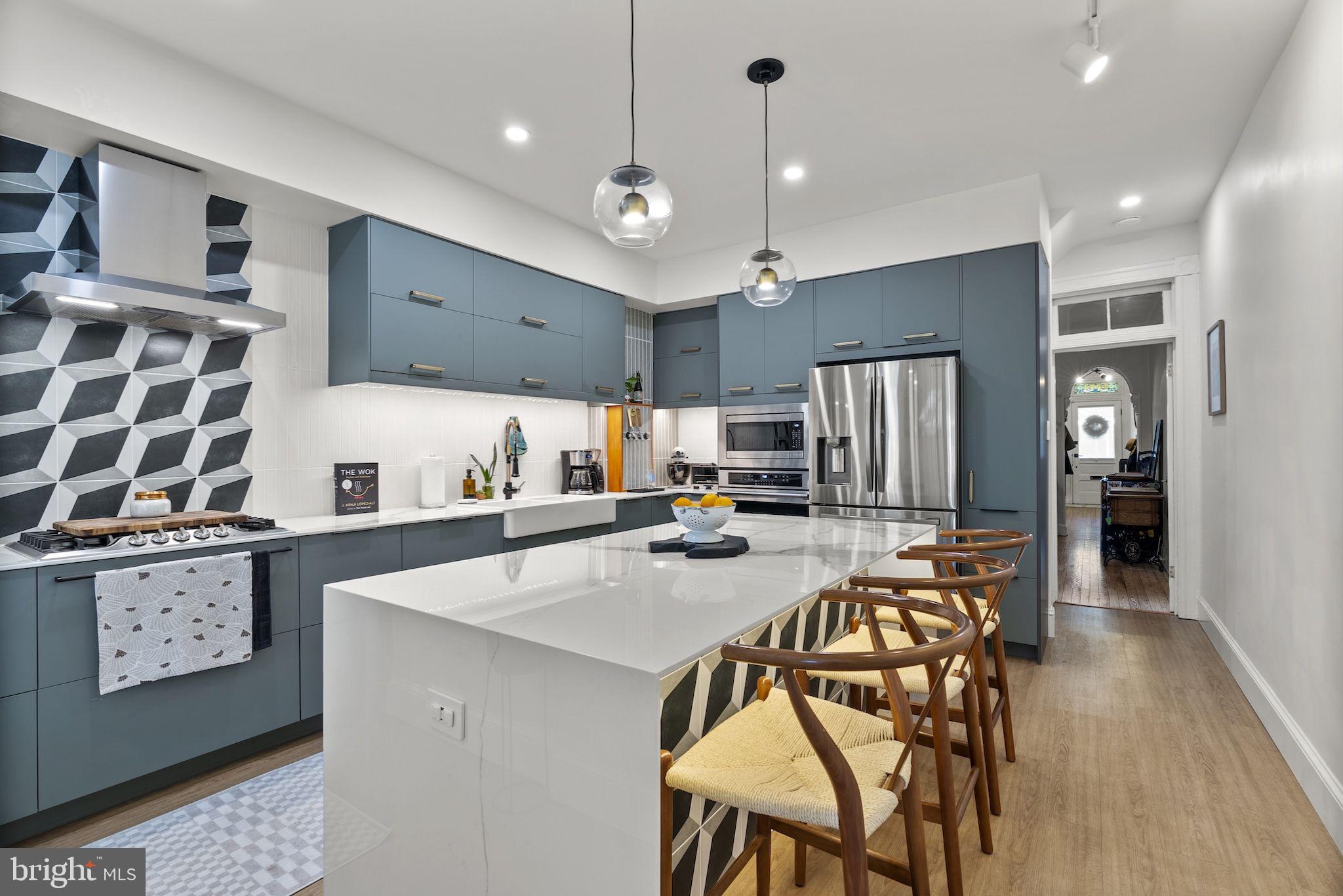 Multiple offers received, highest and best due by 7/13 at 7pm! Welcome to 602 W 33rd St – a beautifully updated 2 bedroom, 2 bath home that perfectly blends classic charm with modern upgrades. Enjoy relaxing on the spacious front porch, then step inside to a bright and airy living room filled with natural light and rich hardwood floors that flow throughout the home. The sleek kitchen is a standout, featuring stainless steel appliances, stunning marble countertops, and a large island – ideal for both everyday living and entertaining. Just off the kitchen, a bonus room provides flexible space for a home office, playroom, or cozy den. Upstairs, you’ll find two generously sized bedrooms. There is an additional den that’s perfect for a guest room or creative studio. The full basement offers abundant storage. The backyard is ready for your personal touch – a perfect spot for gardening or outdoor enjoyment. Close by to Wyman Park, shops, and restaurants this home is a true gem. Don’t miss your opportunity to make it yours!