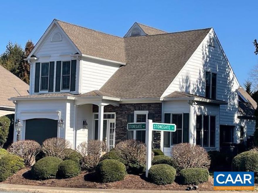 Enjoy convenient living in the Stonegate Community of Western Ridge! Vaulted ceilings accentuate an attractive living room with gas fireplace that transitions to a private and tasteful rear patio with mature landscapes. The light filled kitchen with recently updated appliances and attached eating area make cooking and entertaining a joy! The primary bedroom and bath located on the main level allow for easy care free living. The second level offers two bedrooms along with a Jack-and-Jill bathroom. A loft overlooking the living room is perfect as an office or quiet reading area. The home has been freshly painted and is ready for you to move in and enjoy!,Wood Cabinets,Fireplace in Living Room