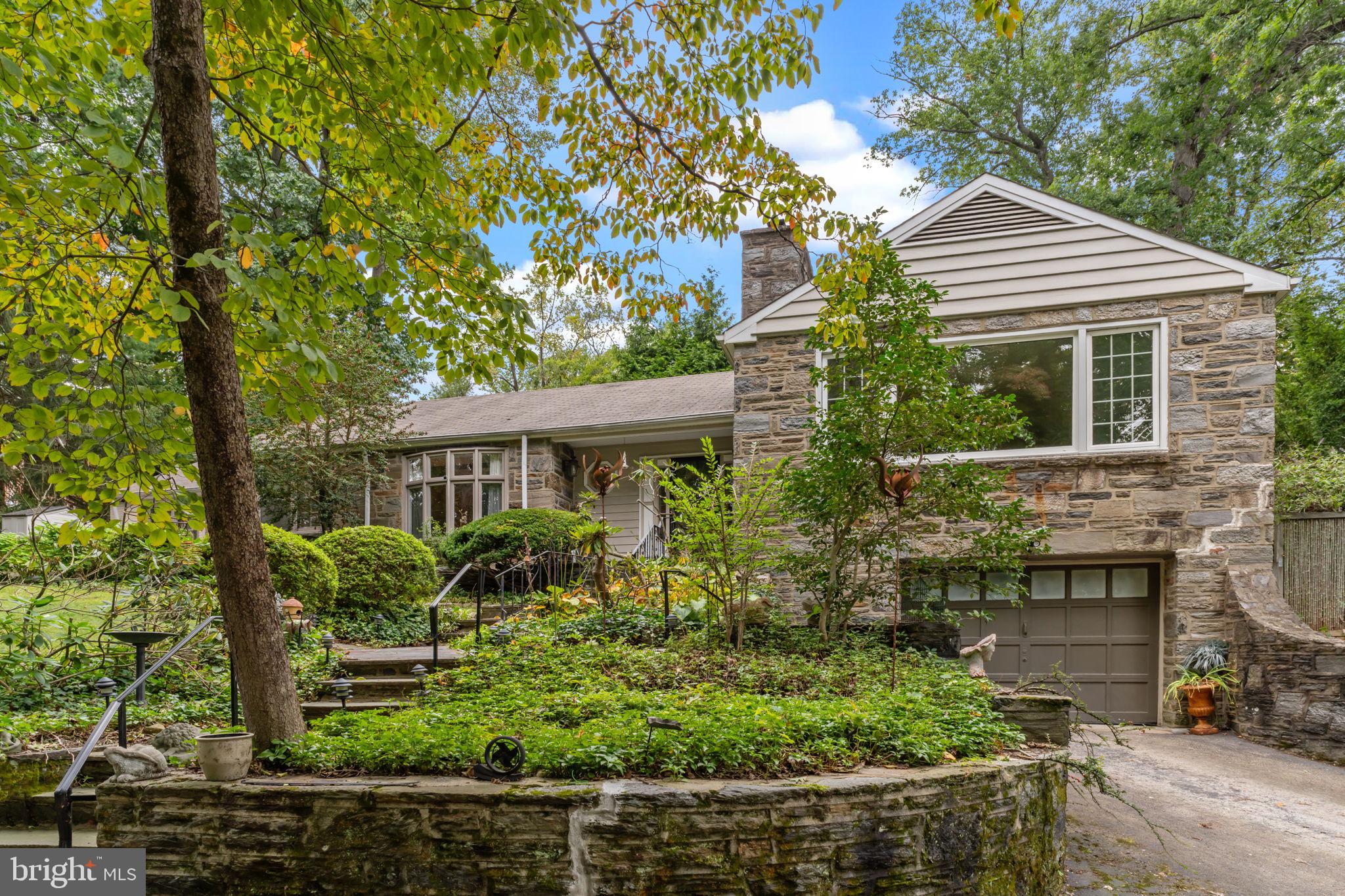 Welcome home to 8316 Jenkintown Rd in Elkins Park. Lovely Ranch style home with old school charm. This 4 bedroom, 2 1/2 bath home is new to the market. Hardwood floors throughout and gleams with natural light with over sized windows. The main bedroom has a private entrance and patio that could possibly be converted to an in-law suite. There are three additional, generously sized bedrooms. An attic spans the entire length of the home with endless potential for expanding. The lower level has a partial finished basement with access to the massive four car garage. Conveniently located to shops, restaurants, grocery stores, public transportation, parks and walking trails. Professional photos and a more detailed description will be uploaded by the end of this week. Schedule your appointment today!