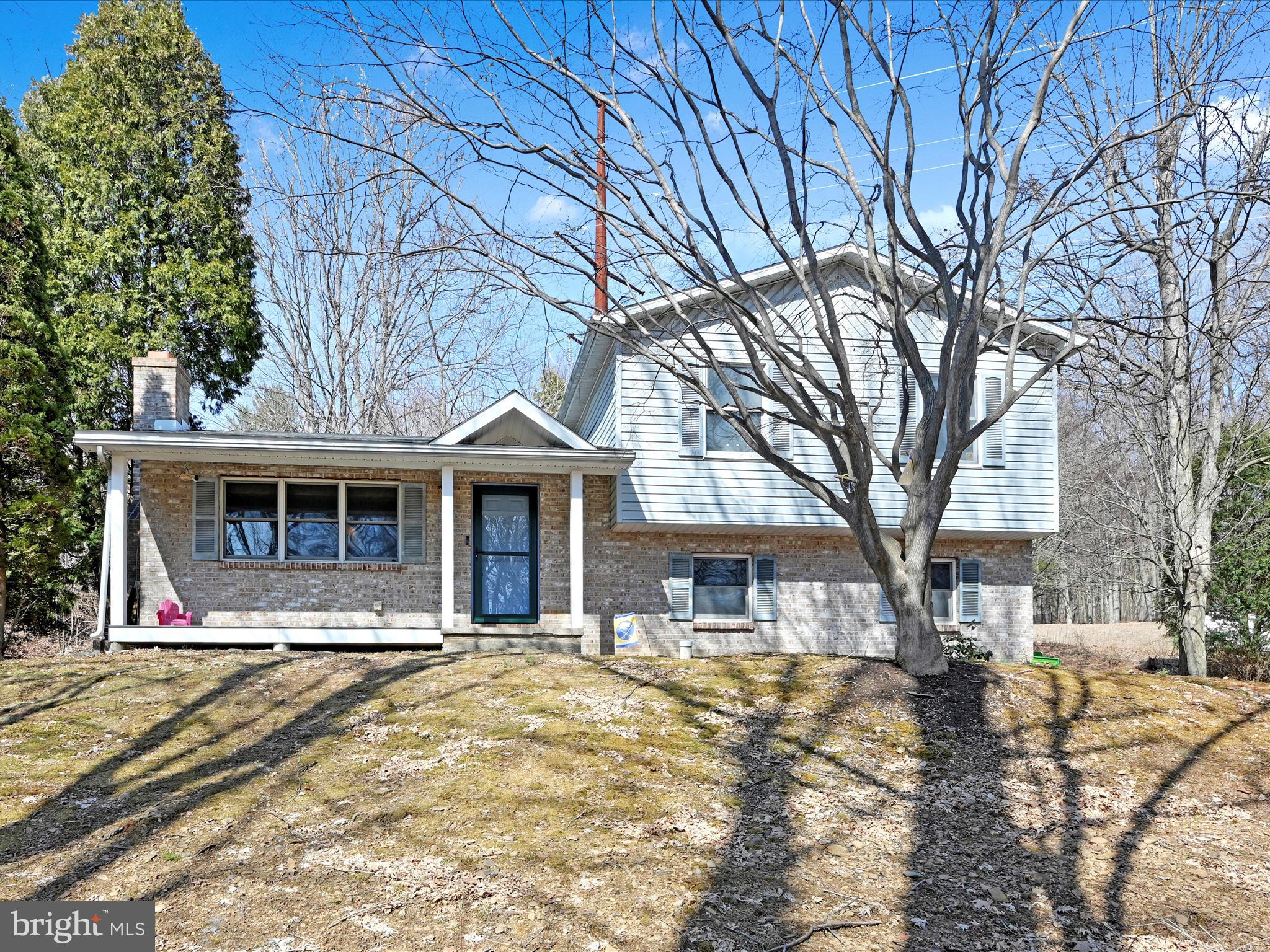 This home at 471 Seltzer Road in Norwegian Township is in a beautiful private wooded setting. It’s situated on .6 acre lot with a private rear deck and quaint front porch. This split level home has a large kitchen with granite counter tops with a breakfast bar and ceramic tile floor. The family room has vaulted ceilings brick/propane fireplace and sliding doors that exit to the rear deck. The living room, dining room and family room all have cherry hardwood floors. The living room fireplace has a coal insert that is currently used for heat. The upper level has 3 bedrooms, 1 full bathroom beautifully tiled, and large primary bedroom walk-in closet. Laundry area located off the garage. Schedule your showing today!