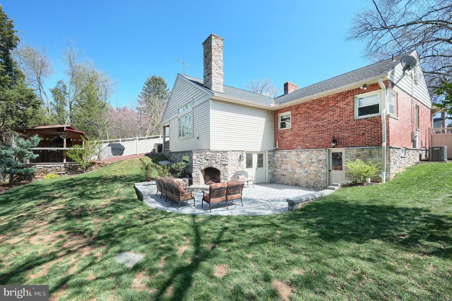 Charming, Meticulous and Move-In Ready Ranch Home in York Suburban School District * Pride of Ownership is Evident * Welcome to this beautifully maintained and updated 3-bedroom, 3-full bath ranch home * This thoughtfully designed property blends comfort, character, and modern amenities, offering spacious living inside and out * Step into the heart of the home — a spectacular two-story great room addition, custom built by Jeff Henry, featuring a floor-to-ceiling, stone gas fireplace and cathedral ceiling that makes a stunning statement * The adjacent dining room exudes warmth with the original and cozy wood-burning fireplace, perfect for hosting family gatherings or intimate dinners * The chef’s kitchen is a showstopper, boasting maple soft-close cabinetry, gleaming granite countertops, newer appliances in 2022, and a center island ideal for meal prep or casual dining * Just off the great room, a mudroom leads to a charming exterior with a covered porch, brick patio with a hot tub, beautiful raised garden and covered deck complete with a breakfast bar and sitting area — a perfect spot to enjoy your morning coffee * Retreat to the spacious primary suite offering a luxurious ensuite bath with a tile walk-in shower, double farm-style sinks and a custom-built dedicated vanity area with granite counter & two built-in linen cabinets * The second full bath, next to the second bedroom, includes a newer claw foot tub with a shower, ceramic tile flooring, pedestal sink, linen closet and wainscoting * The third bedroom is on the second floor and includes adjacent unfinished attic space above the garage, perfect for storage or finishing for additional closet space * The finished basement adds even more living space, and includes a family room with a custom-built slate bar, matching slate built-in shelving and gas-burning fireplace with slate surround and custom mantel, ideal for movie nights or a game room setup * Also included in the basement is the laundry room with folding & hanging areas, an office, storage/mechanical room and the third full bath updated in 2024 with an oversized walk-in shower, perfect for bathing your fur babies * Outdoors, your private oasis awaits with a beautifully crafted stone wood-burning fireplace — a dreamy spot for relaxing or entertaining under the stars * Large exterior storage room * Private fenced yard * Luxury vinyl plank flooring throughout the first floor (with original hardwood underneath) * Covered front porch with recessed lighting on a timer which goes around the entire house * Double concrete driveway with space for four cars * Replacement windows throughout * Front door, back door & front picture window new in 2023 * Two sheds * Stone to grade around entire house * Don’t miss this unique opportunity to own a one-of-a-kind, meticulously maintained home that combines rustic charm, modern elegance, and functional living in York Suburban school district.