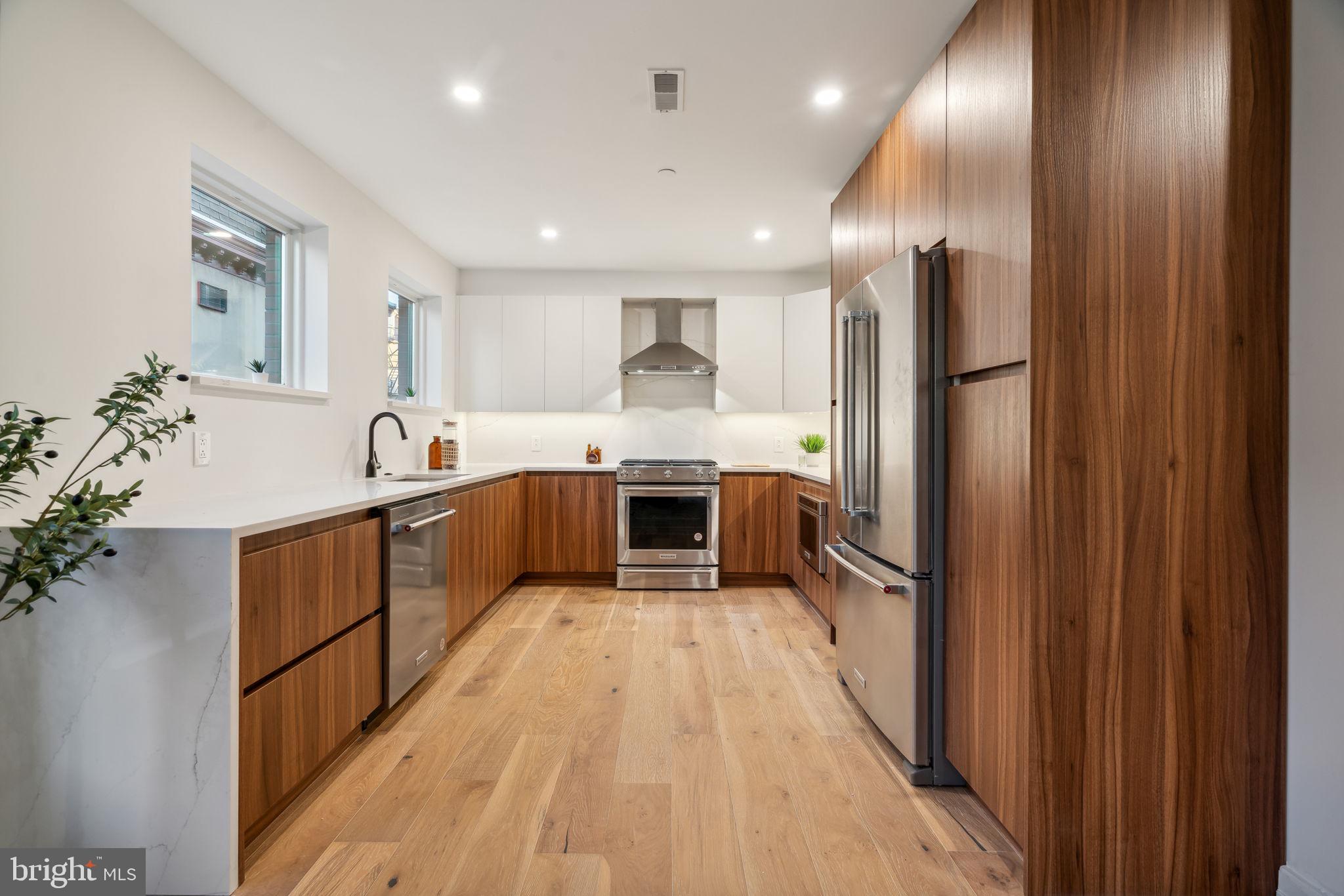 Welcome to the Penthouse at 534 N 19th St! This stunning new construction condominium resides in the highly sought-after Spring Garden neighborhood. As you step through your private entrance, you're greeted by an expansive, open-concept layout filled with abundant natural light. The gourmet kitchen features sleek quartz countertops and backsplash, rich dual-toned chestnut cabinetry, and top-of-the-line stainless steel appliances. With two generously-sized bedrooms and three thoughtfully designed full bathrooms, this home offers plentiful custom closet space and showcases luxury finishes at every turn. Each of your bathrooms boast floor to ceiling shower tile, shower niches and large vanity space. The highlight of this unit is the exclusive private rooftop, offering city wide views of the skyline! This exceptional property also includes a 10-year tax abatement and a 1-year builder's warranty, ensuring both long-term value and peace of mind. Located in the vibrant, historic Spring Garden neighborhood of Philadelphia, this condominium offers a lifestyle of convenience and culture, with world-class museums, parks, acclaimed restaurants, cafes, grocery stores, and iconic attractions all just steps from your door. Don't miss the opportunity to own one of these extraordinary new construction condominiums in one of Philadelphia's most highly desired neighborhoods. Seller is willing to pay for 2 years of prepaid parking at a nearby lot with an acceptable offer.