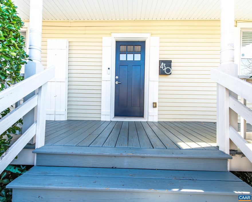 Bright and well-maintained home in the vibrant 10th & Page/West Street neighborhood offering exceptional access to UVA, the Downtown Mall, Dairy Market, parks, and bus lines. This corner-lot property includes alleyway access with off-street parking, a welcoming front porch, and mature landscaping that frames the home nicely. Inside, the freshly updated spaces highlight classic hardwood floors, wide room openings, and a practical built-in drop zone near the entry. The kitchen features modern cabinetry, granite counters, stainless appliances, subway-tile accents, abundant natural light, and a butcher-block work surface. The renovated full bath showcases a tile shower with glass enclosure, upgraded lighting, and a contemporary vanity. A dedicated laundry/mudroom adds convenience with storage and direct access to the rear of the property. This home provides a strong opportunity in a central Charlottesville neighborhood with room for future improvements and personal touches.