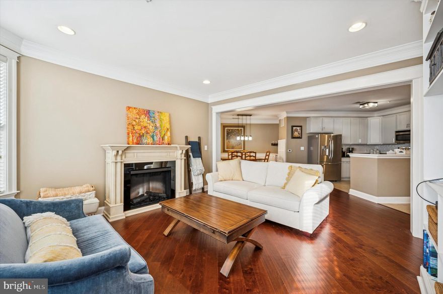 Welcome to Suite #3316 at The Grande at Riverview, a beautifully appointed 2-bedroom, 2-bath corner residence offering refined finishes and effortless, turn-key living. The spacious open-concept living and dining area features custom 8" two-piece crown molding, professional paint, oversized window, door, and baseboard trim, 5" engineered hardwood floors, and an arched exterior wall with expansive windows providing serene courtyard views and abundant natural light. The kitchen showcases dark granite countertops, abundant 42" cabinetry, a striking high-gloss herringbone subway tile backsplash, and a Calacatta quartz upper counter, while the adjacent dining area offers elegant wainscoting, seating for 6–8, and a bar nook with built-in cabinetry and a porcelain tile countertop. The primary suite accommodates a king-size bed and includes a California Closets walk-in closet, a private balcony with sunrise views, and an en-suite bath with porcelain tile flooring, tiled tub/shower surround, and a frameless glass shower with ClearShield protection. The second bedroom features its own private balcony with courtyard and West Conshohocken hillside views, a walk-in closet with custom shelving and dedicated sporting equipment storage, and access to a nearby full bath with shower stall. A full-size washer and dryer are tucked behind double doors in the hallway, and the home includes deeded parking (Space #74), secure building access, a community pool and fitness center, private outdoor gathering areas, direct access to the Schuylkill River Trail, proximity to regional rail, dining, shopping, and downtown amenities, and easy commuting via Routes 76, 476, and the PA Turnpike, with convenient access to King of Prussia and Center City Philadelphia. 2026 HOA $540 monthly