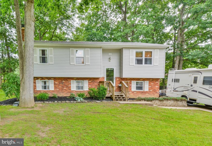 What a rare find, Check out this Beautiful 4 bedroom, 2.5 bath split-foyer with open floor plan, Great custom kitchen with granite counter tops & Stainless steel appliances, walk out onto over-sized deck off of dining room, Large family room with Gas fireplace also walkout to fenced in yard,  Large 12 X 20 Shed with electric. Voluntary HOA (community boat ramp & fishing pier on Grays Creek).