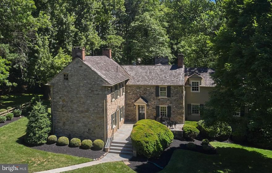 3257 Edison Furlong road,  a stone house which is one of the first houses built in Furlong Pennsylvania in beautiful Buckingham Township. The historic Federal-style home is currently centered on 7.98 acres. Originally a Dairy farm in the 1700's the property was carefully restored by the current owners and is now being offered for the first time in over 50 years.
The home features 4 bedrooms and 2.5 baths along with Key architectural elements, including the original stone structure, cedar shingle roof, original stone sink, six-over-six windows, oak ceiling beams, pine floors, plastered walls, soap stone counter tops, and paneled woodwork, along with additional extensive custom woodwork throughout the home. During the restoration, attic boards were repurposed as floorboards in certain sections on the main level, adding to the home's character and authenticity. Every detail was considered during the restoration. The original stone structure has been thoughtfully expanded with wood frame additions, preserving its historical integrity.
Registered with the Bucks County Heritage Conservancy, the home has a unique charm enhanced by the original Wagon house, which has been converted into a three bay Garage.
The property boasts mature trees and gardens in a park-like setting, offering tranquility and natural beauty. The in-ground pool adds a modern touch, making this home perfect for both relaxation and entertaining. 
The location combines privacy with convenience as the house is set more than 300 feet back from the road, providing a serene environment while being close to modern amenities. The property is just 8 minutes from Doylestown Hospital, 6 minutes to the center of Doylestown, 12 minutes from Wegmans in Warrington, an hour from Center City Philadelphia, and just under 2 hours from New York City.  The  property is located in the highly coveted Central Bucks School district.

With its rich history, charming details, and modern comforts, the property offers a rare opportunity to own a piece of Furlong’s heritage as It provides the perfect blend of historical significance and present day living, ideal for those seeking a unique and storied home.