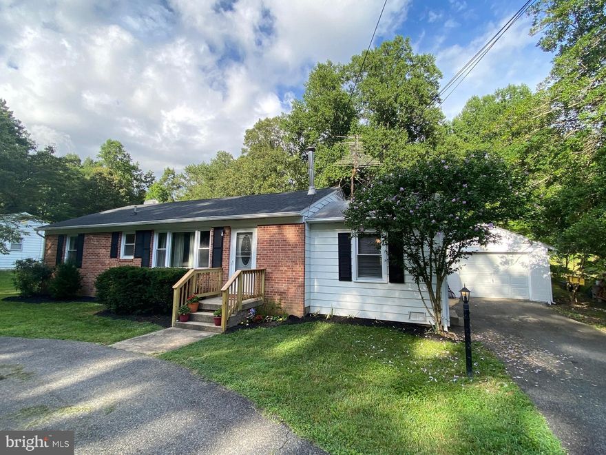 This home has had many renovations and ready for new buyer to take over!!!  Roof replaced in 2018 (except over dining Room) HVAC in 2018.  New Nitrogen  septic Tank in  2013, Water heater in 2011.  electric panel replaced in 2018.  Windows & doors were replaced in 2007. Siding & gutters replaced.   Beautiful master bath & walk in closet addition in 2019 complete with custom tiled shower, heater floor, granite vanity & multiple shower heads.  Hardwood floors. Kitchen floor replaced.  Woodstove.   Large work shop/ shed.  Private back yard.
