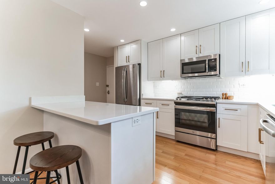 *ALL UTILITIES INCLUDED*  Extraordinary living in Parkside! Clean, maintained, and recently updated 2BR, 2BA condo available OCT 1st.  Nearly 1,400 sqft of living space featuring hardwood floors, a gourmet kitchen with GE stainless steel appliances, quartz countertops, 42" white soft close cabinetry, under cabinet lighting,  dedicated pantry, and recessed lighting. You'll love the spacious main living space - open kitchen to the dining area and living room. Enjoy two large bedrooms 17X17 and 11X13 with huge closets, ceiling fans, and panoramic windows overlooking the wooded area and trees. The updated hall bathroom has a tub/shower and the connecting primary bathroom was renovated in 2022 with tasteful finishes, shower & towel insets, and mirrored vanity. Enjoy the expansive balcony big enough to fit a seating area and table for relaxing, reading, and dining.  Separate storage area space. Laundry is conveniently located on the same level as the unit. Minutes to Grosvenor Metro, Grosvenor Market, Meridian convenient store, 495, 270, NIH. Good credit, no pets, no smoking please. Schedule a showing today!