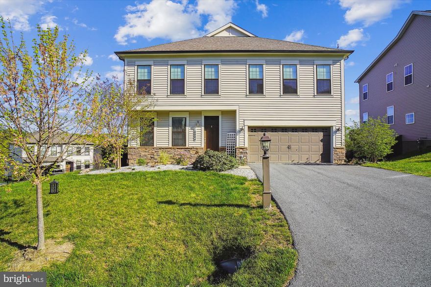 Nestled in the sought-after Lake Linganore community, this exquisite 5-bedroom, 3.5-bath stone and vinyl siding home offers a perfect blend of elegance and comfort. Situated on a spacious corner lot, the property boasts a fenced rear yard and a deck that provides serene views of lush trees and distant mountains .​
Step inside to discover an open and inviting floor plan adorned with engineered wood floors on the main level. The gourmet kitchen is a chef's dream, featuring upgraded stainless steel appliances, elegant countertops, ample cabinet space, and a large island ideal for casual family gatherings or entertaining friends. Adjacent to the kitchen, the sunlit breakfast room offers spacious table space for large gatherings. 
From the kitchen area you can overlook the cozy family room, complete with a stone fireplace, provides a warm and inviting space to relax and unwind. Upstairs, you'll find generously sized bedrooms with large closets. The luxurious primary suite boasts a huge walk in closet and a primary luxury bath with upgraded tile finishes. The finished basement is an entertainer's paradise, offering a spacious recreational area perfect for game nights or movie marathons, a full bathroom, and a fifth bedroom for guests or a home office.​ Living in Lake Linganore means access to a wealth of amenities, including outdoor pools, scenic walking paths, playgrounds, and breathtaking lakes . All this is just minutes from I-70 and the historic towns of New Market and Frederick, known for their award-winning restaurants and quaint shops.​
Don't miss the opportunity to own this exceptional home in a vibrant community that combines natural beauty with modern luxury. Schedule your private tour today!