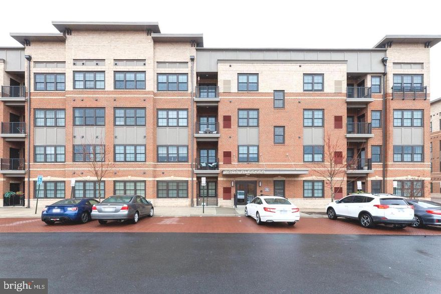 Stunning 2 bed/2 bath condo in the heart of Vienna, just steps from Vienna/Fairfax Metro Station! This unit is open floor plan with spacious living/dining areas, plenty of windows that bathe the home with natural light. Gourmet kitchen features granite counters with breakfast bar seating, dark maple cabinets, stainless steel appliances, and hardwood floors. Primary suite features walk in closet and luxury en-suite bath. Enjoy the spacious balcony overlooking the neighborhood! This is a fob- secured building which includes elevator access, 2 assigned underground garage parking space and outside parking spaces. Amenity access to the Providence Community Center's gym/fitness center, game room and more. Commuter's dream location! Quick access to routes 29, 495 and 66!