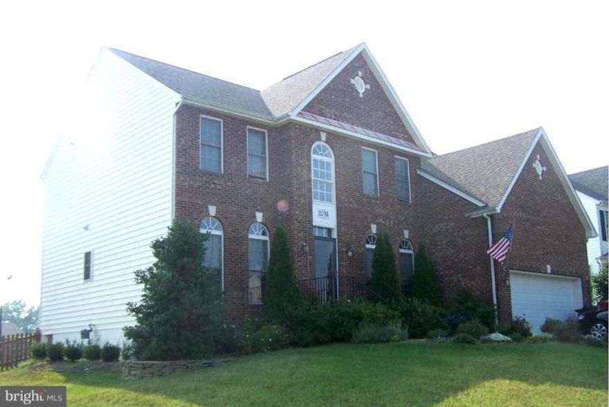 Beautiful brick front 5 bed home backs to tennis courts! Two story family room, w/gas fireplace open to island kitchen. Huge screened porch and fenced yard for summer fun. Luxurious master suite, dual vanities.  Fully finished basement. Main floor office w/French doors. Main level full bath. Fresh paint, new carpet and wood. 4000 Sq. Ft. of living space to enjoy.