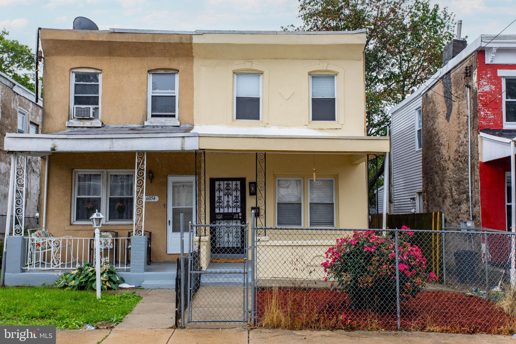 Welcome to 6056 Callowhill Street – A Charming Twin Home in West Philadelphia. Discover comfort and convenience in this well-maintained 3-bedroom, 1-bathroom twin home located on a spacious road with ample street parking in Philadelphia. A gated walkway and inviting front porch set the tone as you approach the home. Step inside to a spacious living room with beautiful hardwood floors and a decorative brick fireplace that flows seamlessly into the dining room—perfect for everyday living or entertaining guests. The kitchen features low-maintenance vinyl flooring, brand new countertops, stainless steel appliances, and direct access to a private patio and fenced in backyard—ideal for morning coffee, summer BBQs, or simply relaxing outdoors. Upstairs, the hardwood floors continue throughout all three bedrooms. The primary bedroom offers a cozy and comfortable retreat, while two additional bedrooms are perfect for children, guests, or a home office. The full hall bathroom includes a single sink vanity and a tiled tub/shower combo. The finished basement adds valuable extra living space as well as a designated laundry area. Use it as a rec room, media space, workout area, or whatever suits your lifestyle. Located just blocks from Carroll Park, with easy access to local grocery stores, restaurants, and public transportation, this home truly has it all. The finished basement provides additional square feet of living space for this home! New roof, new A/C, new plumbing, new appliances, new washer & dryer, new hot water heater, new siding in rear, new countertop, new two inch Foxwood blinds, new lighting and more so don't miss your opportunity to make 6056 Callowhill Street your new home!