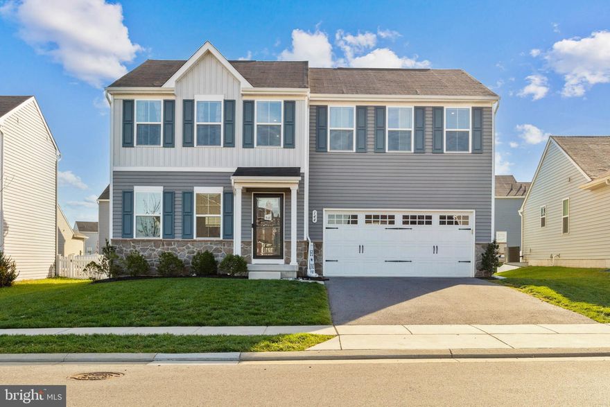 PRICE IMPROVEMENT.  BRING YOUR BELONGINGS.  USDA ELIGIBLE.   

Four years young, this immaculate home,  located in charming Meade's Crossing Community features a bright and open concept design, this home boasts four bedrooms and 2.5 bathrooms. The upper level is home to four bedrooms, including a luxurious Owner's Suite with a generous walk-in closet and a private ensuite bathroom with an extra-wide stall shower. Additionally, you'll find a conveniently located laundry room on the upper level,  a hallway full bathroom, three additional bedrooms, two of which have spacious walk-in closets.

The sellers have recently upgraded the main level with brand new waterproof luxury vinyl plank flooring. As you step into the main level foyer, you'll enter a Great Room/Kitchen featuring an island, a large sink, and high-quality GE stainless steel appliances and beautiful dark cabinets.  Dining area with a generous sized pantry. A short hallway leads to a convenient powder room,  access to the 2-car garage, and a flex room that can be customized to your needs (home office, hobby room, play room, etc...) making it perfect for relaxation and entertaining.

Step outside to the large VINYL-FENCED  yard, ideal for spending quality time with family and friends, as well as your four-legged companions.

The lower level presents a full, unfinished basement with a rough-in for a three-piece bathroom, offering ample space for your creative ideas to transform it into a welcoming living area.

This peaceful and meticulously landscaped community provides an array of amenities, including a community outdoor pool, a fitness center, a clubhouse, walking paths, playgrounds, a dog park, volleyball and basketball courts, and access to a community garden plot.

Conveniently located near shopping, dining, and Route 140.  Schedule your tour today and experience the warmth and comfort this home has to offer!