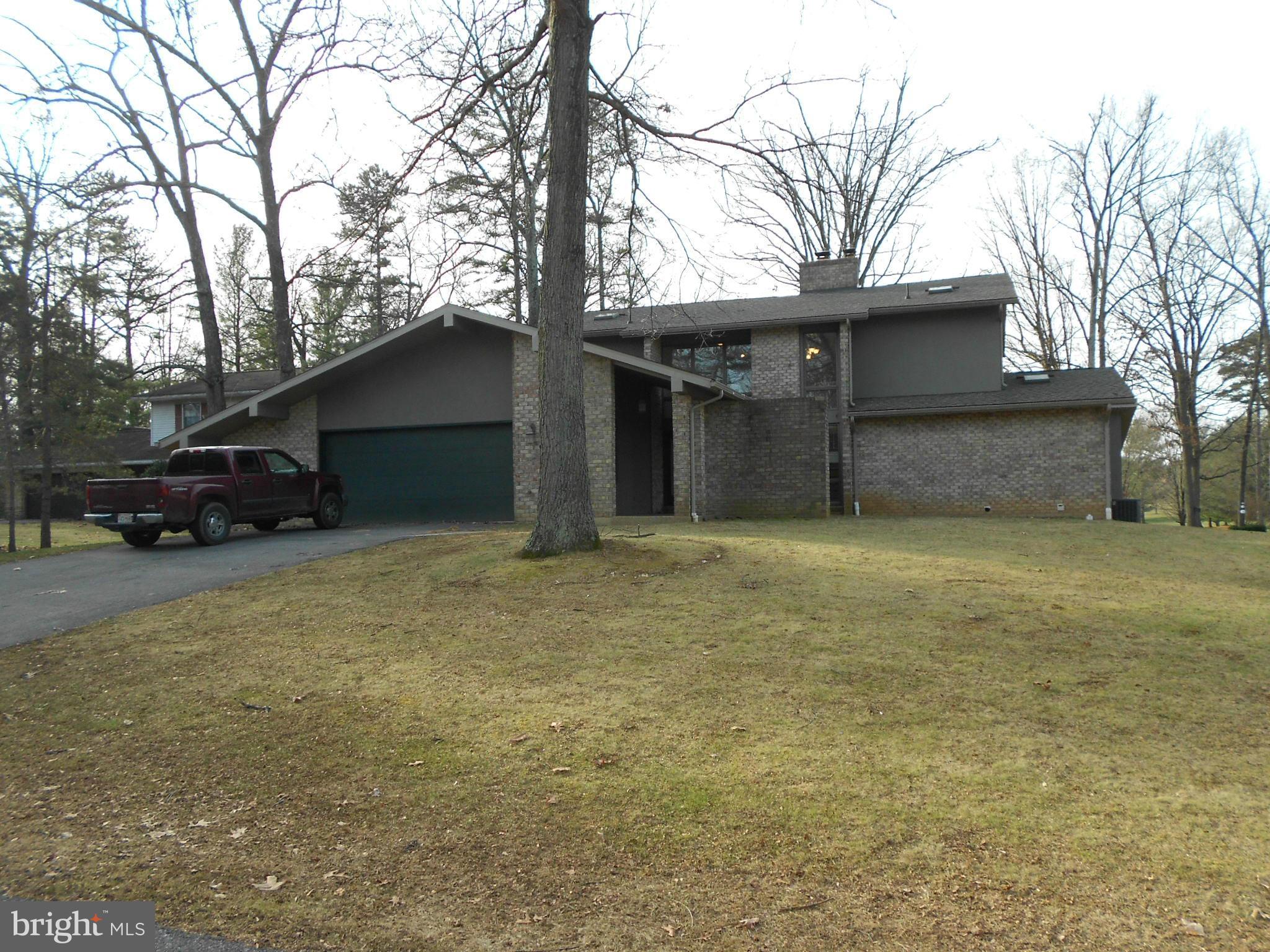 Beautiful Panoramic Views of the 15th Green! Contemporary Home in Penn National! 3+ Spacious Bedrooms and 4.5 Baths. Main Level Master Suite and Laundry! Stainless Steel Appliances and Corian Counters. Open Floor Plan and Vaulted Ceilings. Walk-Out Basement with In-Law Suite; Full Bathroom, Laundry, and Second Kitchen in Lower Level. Dual Heat Pumps. Approx. 3000 square feet of living space!!