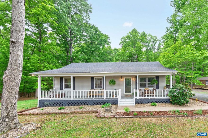 ADORABLE, well maintained, country cottage located in the midst of Fluvanna County. Imagine rocking on this front porch on a wonderful afternoon, or enjoying your morning coffee on the back deck. If city living gives you the blues, and you don't want to deal with an HOA, this home checks those boxes. Comfortable living with 3 bedrooms, 2 baths, a spacious living room and kitchen, you can't ask for more. The 2.26 mostly level acres allows for extensive gardening, perhaps a few chickens and plenty of space for kids and critters alike. Enjoy lounging in a hammock tied between 2 trees while sipping a cold ice tea after work. Or enjoy live music and refreshments down the street at Cunningham Creek Winery/Brewery or enjoy Ruritan Lake, within walking distance and Just minutes to shopping and a quick commute to Zions and easy access to Cville, this home may be just the perfect place for you.,Wood Cabinets