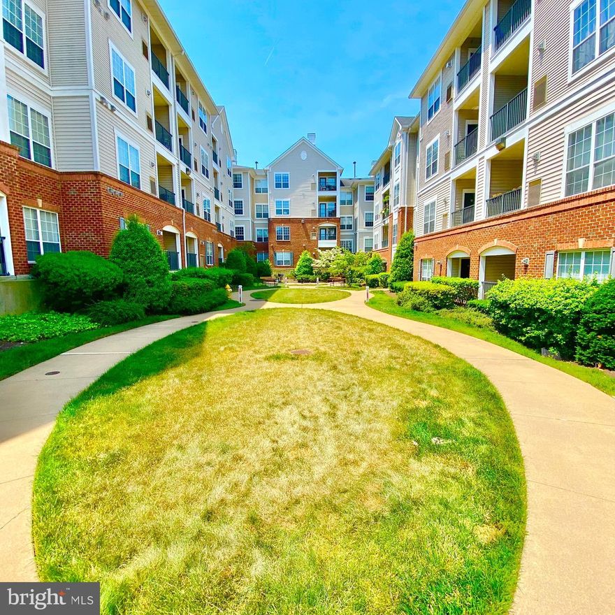 Welcome to 4850 Eisenhower Avenue, Unit 115 in Alexandria VA! Well maintained 2 Bedroom/2 Full Bathroom ground floor Condominium located in the Exchange at Van Dorn. Beautiful hardwood floors in the living room and dining room. Primary Bedroom has vinyl plank flooring, Primary Bathroom, walk in closet and lots of space. Bedroom 2 has vinyl plank flooring, 2 closets and sits across from the hallway bath which includes soaking tub and linen closet.  Large living room has crown molding, recessed lighting and access to private balcony area. Separate dining area with updated light fixture off living room. Kitchen has nice wood cabinets, laminate counter tops and separate laundry area off kitchen with full size washer and dryer. Pets allowed on case by case basis, NO CATS. Unit comes with 2 Garage Parking Spaces. Water, Sewer and Trash Removal included in rent. Amenities include Outdoor Swimming Pool, Fitness Room, Business Center, Party Room and Basketball Court. Short distance to Van Dorn Street Metro, 395, 495 (Capital Beltway), Pentagon, Old Town Alexandria, and DC. Condominium Association requires a $300.00 Move In Fee.