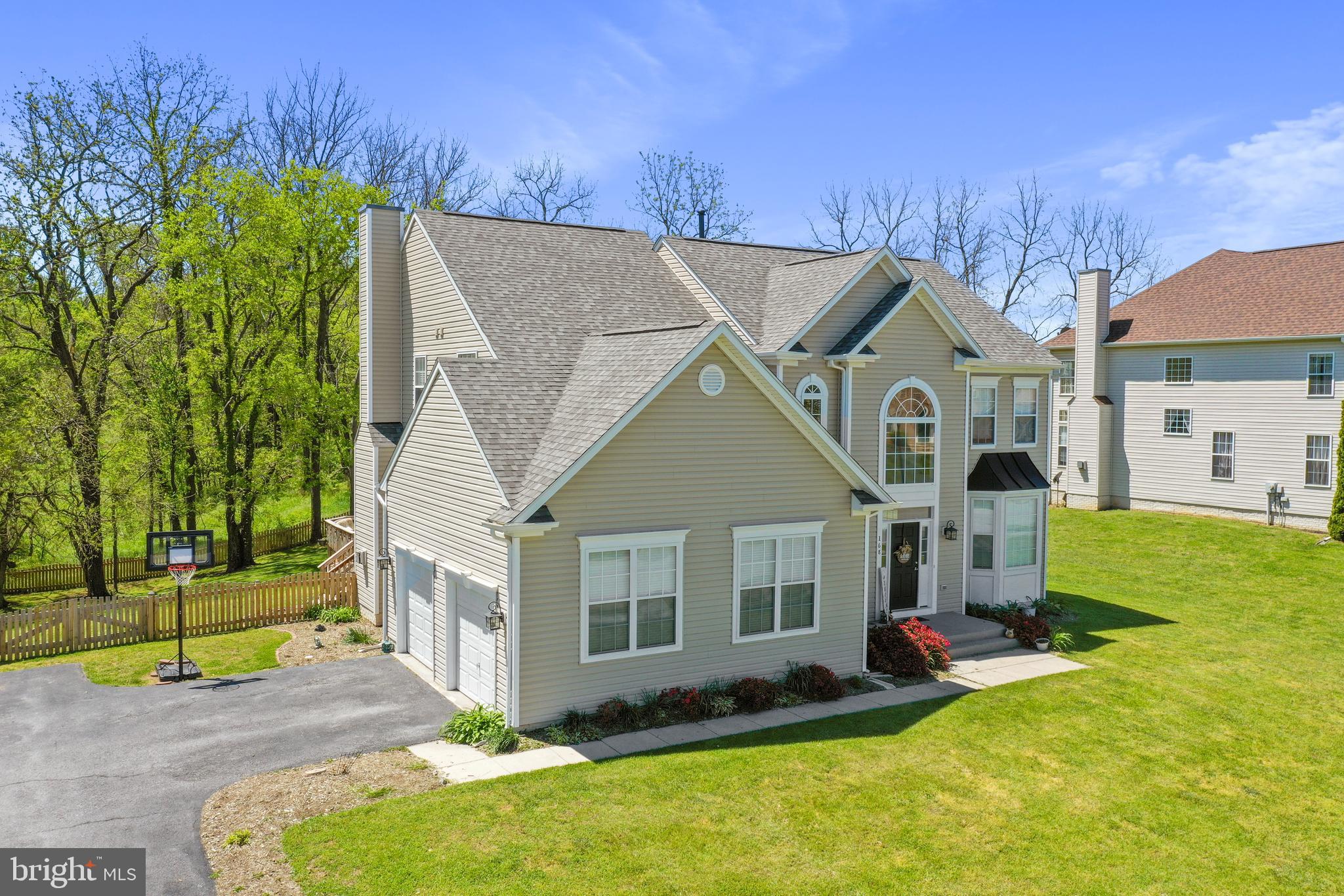 Seller is offering $10,000 toward buyer's closing costs.
Spacious & Elegant Home with Over 4,000 Sqft – Prime Charles Town Location!
This beautifully designed home offers over 4,000 square feet of finished living space, including a fully finished walk-up basement. With 4 spacious bedrooms, 3 full baths, and 1 half bath, this home has room for everyone—plus two additional rooms in the lower level that can be used for guests, an office, gym, or hobby space.
Step inside to a grand foyer with soaring 18-foot ceilings and a dramatic balcony overlook from the second floor. The main level features formal living and dining rooms with gleaming hardwood floors, and a central kitchen equipped with stainless steel appliances, a center island, and striking black granite countertops. The light-filled main living area is framed by tall windows and a gas fireplace, with an open-concept flow that leads to a versatile bonus bump-out space—ideal for an office, breakfast area, or playroom.
Downstairs, the finished basement boasts a large living/recreation room, two additional flex rooms, and a full bathroom—perfect for multigenerational living or entertaining.
Enjoy peaceful outdoor living in the fully fenced backyard that backs to mature woods for added privacy. The property also includes a deck, storage shed, and owned propane tank. A 2-car garage adds convenience, and the location is unbeatable—just minutes to Route 340 and Virginia commuter routes.