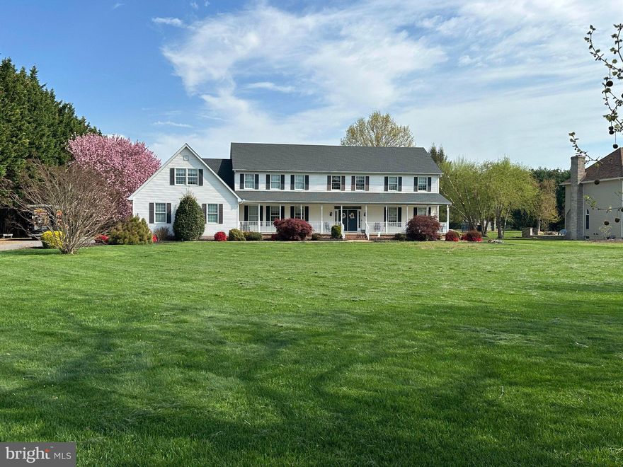 Unique and rare opportunity to own this beautifully maintained home that sets on 1.99 acres in a country setting with no HOA. Generous space to build and additional garage/pole barn and pool if desired. An expansive 4,300-square-foot residence offers 5/6 bedrooms and 3.5 baths, including two primary suites, one conveniently located on the first floor.
The home features a three-car garage, a  brick walk that welcomes you to a  large front porch. The outdoor living offers a sizable a screened-in porch and deck, perfect for relaxing or entertaining. Inside, the home has been lovingly maintained and thoughtfully designed for both comfort and functionality. No need to worry about roof and window replacement here as they were completed in 2018.
Enjoy a large living room that leads to the dining room along with a family room featuring a gas fireplace and custom wood work that presents this room warm and cozy. Its open to a well-appointed kitchen that meets all your cooking and entertaining needs. Generous storage is found throughout the home.
All bedrooms are impressively sized and offer ample closet space, ensuring comfort for family and guests alike. This property combines space, privacy, and versatility—ideal for multigenerational living or those seeking room to grow.