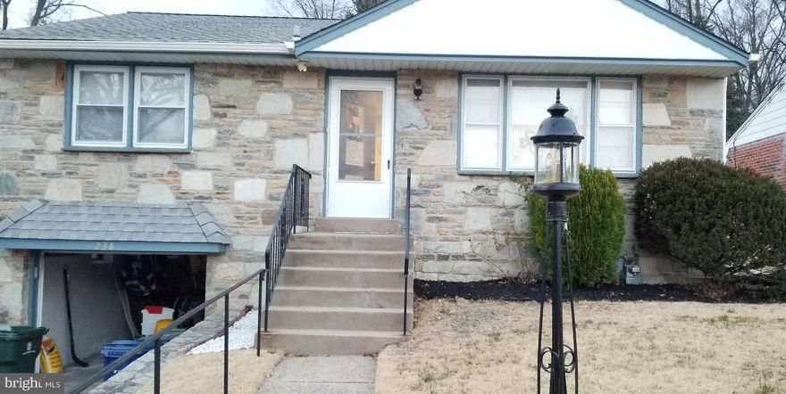 Charming 2 bedroom 1 and a half bath in Elkin's Park.  Spacious living room with newly finished hardwood floors. The newly renovated contemporary kitchen is epuipped with stainless steel appliances, new cabinets, quartz countertops, tile backsplash, and all new recessed lighting. One car garage and large rear yard with brand new concrete patio.