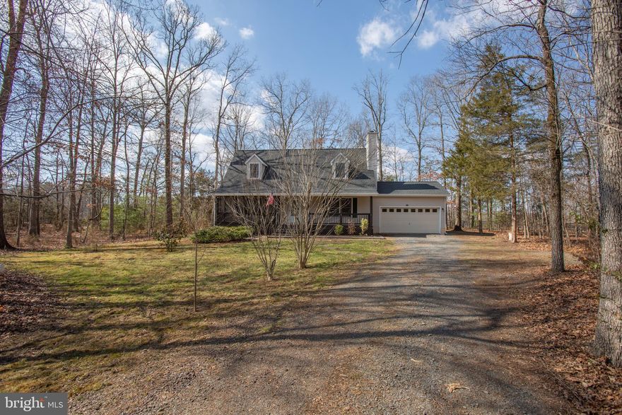 Don’t miss this beautifully updated Cape Cod home! Surrounded by privacy you'll love the .81 acre cul-de-sac lot and all the wonderful Lake of the Woods amenities. Offering 3 bedrooms, including a Main Level suite and 2 nice BRs and full Bath on the upper level, it’s perfect for so many lifestyles. Jam-packed with so many quality updates in the past 6 months - 30 yr architectural roof, new flooring throughout, fresh paint, new soft close white cabinets, granite tops and stainless sink, new disposal, new microwave, new refrigerator with ice and water, new light fixtures and more! Heat pump and DW replaced in 2020. You’ll feel like you’re always on vacation with front partially screened porch and rear deck plus this terrific lot is adjacent to Hollyfield Park so you can walk to tennis, pickle ball and more, or take a .06 mile walk to a nearby Beach. It’s difficult to convey all that Lake of the Woods offers…550 ac Lake for boating, additional Fishing Lake, Golf Course, Equestrian Center, Beaches, Gym, dozens of Clubs, a Clubhouse with restaurant offering delish food, a bar gorgeous lake view and the list goes on… See it soon!