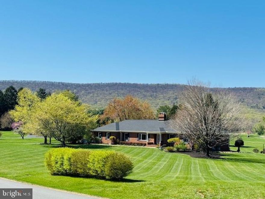 Nestled next to the gates of Evergreen Country Club and the historic boutique hotel The Inn at Evergreen, this one of a kind main-level living home on a premium 2.37 acre lot is the gem of the sought after community that is Evergreen Farm. The welcoming exterior features a long driveway leading to a 2 car side load garage plus golf cart parking, impeccable landscaping along a walk-way to a covered front porch ready for countless hours of relaxation while rocking your worries away and watching nature pass by.  NEW 50 year roof(2023), NEW attic insulation and radiant barrier, Newer gas boiler for radiant heat, top of the line water softener/filtration system and newer septic tank(2018) all for worry less living. With over 4200 finished square feet on 2 levels, the open concept interior is an environment of refined authenticity and elegance with durable hardwood floors; crown and chair moldings; plenty of recessed lighting; upgraded light fixtures and ceiling fans; and a neutral color palette throughout ready for your personal touches. The gourmet kitchen is a chef's dream, boasting stainless steel Wolf appliances to include the gas cooktop; copper sink; island and bar; granite countertops; recessed under cabinet lighting; backsplash; custom pantry with stealth black board door; and opens to a large entertaining room with custom tray ceiling and wall to wall windows ready for game night or a cozy night in next to the fireplace while taking in the spectacular views of the golf course and Bull Run Mountain.  The luxurious primary suite is the perfect retreat, with a large en suite bath and private entrance to one of the bedrooms perfect for a nursery or office. Three additional generous bedrooms, full bathroom, a formal living and dining room as well as a large mudroom complete the main level. The finished walk up basement has a sprawling rec room with a fireplace and wet bar, flex room for gym or teen space, a spa-like full bathroom ready for a sauna and offers plenty of storage or endless options for more finished private or shared living spaces. Spend countless weekends entertaining or just relaxing on the newly stained deck with built-in grill and steps down to an impressive stone patio and flat backyard with majestic golf course and mountain views.  
 In-ground dog fence for your four legged family members.  Minutes to groceries, restaurants, parks, and everything Haymarket/Gainesville have to offer. Don’t Miss Out!