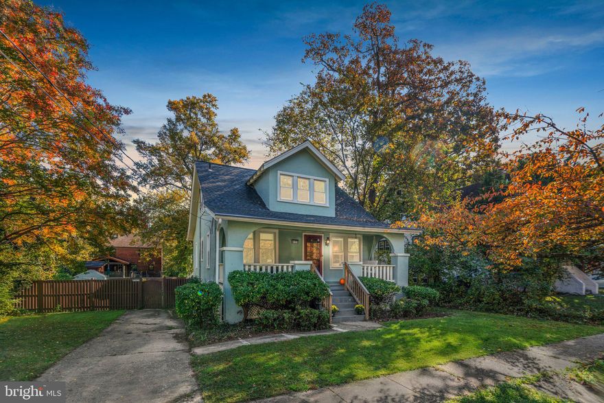 This 1931-built bungalow, situated in the heart of historic Hyattsville, epitomizes a perfect blend of vintage charm and modern functionality. Boasting 1,544 square feet of living space and a generous 9,147 square foot lot, the residence offers an abundance of space and comfort.

Upon entering, one is welcomed by a living room adorned with oak floors, sconces, and natural light streaming through two windows. The dining room features built-in shelves and a chandelier, leading to an updated kitchen equipped with a garden window, quartz countertops, and ample cabinetry. The kitchen opens up to a sunroom, enveloped by windows on three sides, and a deck that descends to a fenced-in backyard.

Location
The residence is strategically located, offering convenient access to both MARC Train and METRO. It is less than a mile from the Arts District Hyattsville, featuring establishments such as Busboy's & Poets, Yes Organic Market, Franklin's Restaurant & Brew Pub, and Riverdale Station with Whole Foods, Starbucks, Denizen's, and Gold's Gym.

The property comprises five bedrooms spread across the upper levels, in addition to a finished basement apartment that opens to a brick patio. This versatile space is ideal for in-laws, au pairs, or as a home office.