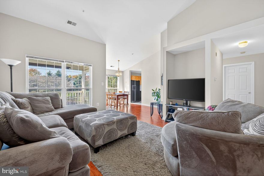 Welcome to Echo Glen! This beautifully maintained top-floor condo offers 3 spacious bedrooms and 2 full baths with an open, light-filled layout. Enjoy vaulted ceilings, a private balcony overlooking green space, and a large primary suite with walk-in closet and ensuite bath. The kitchen flows into the dining and living areas - perfect for entertaining or relaxing at home. Quiet, well-kept community with ample parking and convenient access to shopping, dining, and commuter routes including I-270 and US-15. Condo fee includes water, sewer, trash, lawn care, and snow removal for easy living. Move-in ready and waiting for you! A selection of rooms have been virtually staged. Washer/Dryer replaced within last 3 years!