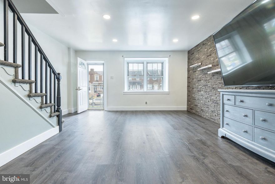 This beautifully updated 3-bedroom, 2-bathroom home is a true gem in the heart of the Mayfair neighborhood. Recently renovated, this home combines modern upgrades with timeless charm, offering everything you need for comfortable living. Key Features: Spacious Living Areas: Step inside to a bright and inviting living room with updated flooring, fresh paint, and plenty of natural light—perfect for relaxing or entertaining. Modern Kitchen: The kitchen was tastefully renovated to include updated cabinetry, sleek countertops, and modern appliances. Three Comfortable Bedrooms: Upstairs, you'll find three well-appointed bedrooms with ample closet space and an updated full bathroom designed with contemporary fixtures. Finished Basement: The finished basement equipped with a full bathroom offers a versatile space that can serve as a family room, home gym, playroom, or office—tailored to suit your lifestyle. Private Driveway: Enjoy the convenience of a private driveway at the rear of the property, offering off-street parking for you and your guests. Outdoor Space: A cozy front patio area provides space for outdoor gatherings, gardening, or just enjoying the fresh air. Why You'll Love This Home: Renovated for peace of mind, this home offers modern conveniences and stylish finishes while maintaining its classic Philadelphia rowhome character. Conveniently located near shopping, dining, schools, parks and public transportation, you'll enjoy easy access to everything the city has to offer.