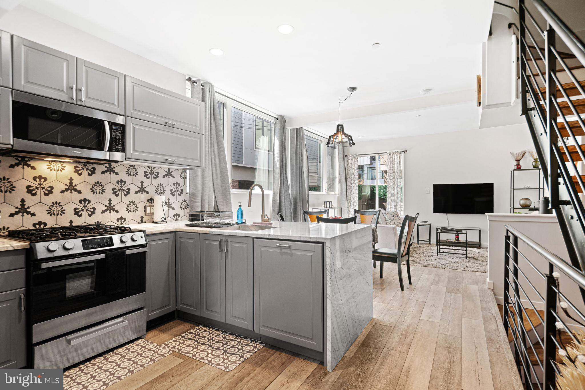 Bright, modern and fully-furnished, this 3-bedroom, 2.5-bath Northern Liberties townhouse is move-in ready! Renovated in 2018 and lovingly maintained, the property offers amazing natural light and plenty of space. Roomy open layout on first floor with kitchen, dining area and living room, plus a half bath. Sunny patio off the living room is perfect for morning coffee and after-work relaxation. Second floor primary suite with king-size bedroom, primary bathroom with twin vanities, sculptural tub and glass-enclosed shower, plus a huge walk-in closet. Two additional spacious bedrooms and full bath on third floor. Fully-finished basement offers flexible space that can be used for an office, playroom or den. Laundry room with full-size washer and dryer. Tastefully furnished with attention to detail, this immaculate property offers curated comfort -- just unpack your clothes and you're home! Located in the heart of thriving NoLibs, with great restaurants and lively night-life, fine retail, galleries and public transportation. Available July 14; first and last months rent and security deposit due at lease signing. Sorry, no pets and no smoking in this pristine home. Call today to learn more and make this outstanding rental yours!