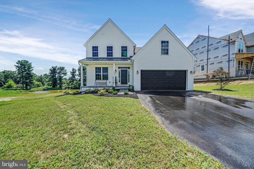 MODEL HOME OPEN -Welcome to Sycamore Crossing - A new construction community in the heart of Oxford. This listing is for the ACTUAL New Model which has been completed featuring a beautiful open floor plan, oak tread staircases, Gourmet Kitchen, Custom-built entertainment center and cabinets, 1st Floor Primary Suite with spa-like Bath.  High-End Finishes include Granite/Quartz Counter Tops and Stainless Steel Appliances, and high-end laminate tile flooring throughout the First Floor. Bright and cheery main living area with gorgeous views of the adjacent pond!  Fully finished walkout lower level adds over 1,000 sq ft of living space and adds an additional Full Bathroom and tons of space for entertaining. **Take advantage of the special financing available through the builders lender. Offering 3% down, and no PMI, saving your buyer $300+- per month in their payment!** Rarely does such an amazing opportunity present itself!