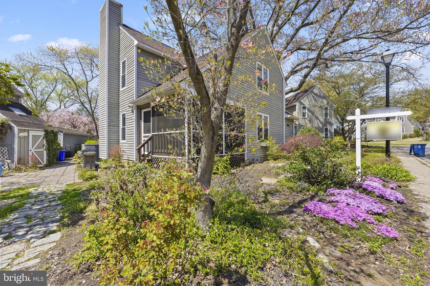 Welcome to Your Annapolis Dream Lifestyle!  Fall in love with this sun-drenched, beautifully positioned home in the highly sought-after Southwoods community—just moments from everything that makes Annapolis so special. Imagine strolling to downtown for Navy games, enjoying waterfront dining, or taking daily walks along charming Main Street with your furry companion. This is more than a home—it’s a lifestyle. Step inside to a bright, open-concept floor plan designed for modern living and effortless entertaining. The seamless flow between living and dining spaces is anchored by a cozy fireplace—perfect for gathering with family and friends. Unwind on your screened porch with a refreshing drink, overlooking a low-maintenance yard bursting with color and fragrance—your own private retreat.  Upstairs, this rare layout features two spacious primary en suites, each offering comfort and privacy. One bath is enhanced by a skylight, filling the space with beautiful natural light.  The versatile lower level expands your options with a home office or third bedroom, media/lounge area, and laundry room—with a rough-in ready for a third full bath. The kitchen shines with warm wood flooring and upgraded stainless steel appliances, including a sleek smart touchscreen refrigerator—blending style and function perfectly.  With timeless appeal and room to add your personal touch, this home is an incredible opportunity to create something truly special. All just minutes from downtown Annapolis, the Naval Academy, marinas, yacht clubs, shopping, dining, and easy access to Route 50. Opportunities like this don’t last—schedule your showing today and start living the Annapolis lifestyle you’ve been dreaming of!  Bring Offers for Seller to Review!