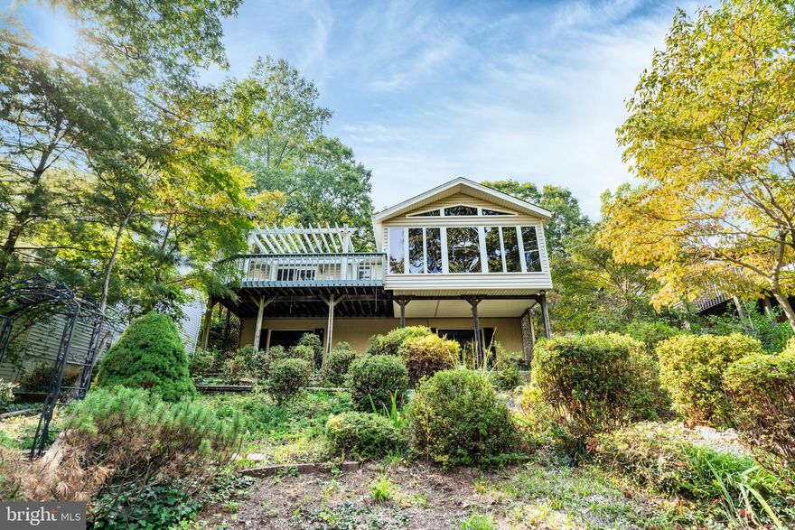 *****SPECTACULAR WATERFRONT ON KEATON'S  LAKE****THIS HOME FEATURES THREE BEDROOMS, THREE FULL BATHS, TWO CAR GARAGE AND LOTS OF EXTRA PARKING, EASY ACCESS TO GOLF COURSE, TWO LAUNDRY AREAS, A SPACIOUS LIVING ROOM WITH HARDWOOD FLOORS AND AN ELGANT RAISED HEARTH GAS FIREPLACE--LEADING TO A SUN-FILLED ALL SEASON ROOM OVERLOOKING  61 FEET OF WATERFRONT.  BRING YOUR FISHING POLES, KAYAKS, PADDLEBOARDS OR PONTOON AND ENJOY A LOVELY FLOAT DOWN THE LAKE OR JUST RELAX AND WATCH THE ABUNDANCE OF WILDLIFE. *** MAIN LEVEL PRIMARY BEDROOM W/ EN-SUITE WHICH EXITS ONTO A 20X12 DECK WHERE YOU CAN ENJOY THAT CUP OF MORNING COFFEE .  LARGE SECOND BEDROOM WITH HARDWOOD FLOORS AND A SECOND LAUNDRY.   LOWER LEVEL OFFERS LARGE RECREATION ROOM WITH GAS HEATER AND WET-BAR PERFECT FOR GAME NIGHT.   THIRD BEDROOM WITH SLIDING GLASS DOORS LEADING TO COVERED PATIO.  **SECOND LAUNDRY AREA.  ***** WHILE VISITING PLEASE CHECK OUT ALL THE WONDERFUL AMENITIES LAKE OF THE WOODS HAS TO OFFER INCLUDING:TWO LAKES, FISHING, BOATING, BEACHES, JET-SKIING, TUBING, WATER SKIING, WAKE BOARDING, PADDLE BOARDS, KAYAKS, ETC. ***  ENJOY FINE DINING AT THE CLUB HOUSE OR A QUCK DRINK AND BITE TO EAT AFTER A ROUND OF GOLF AT THE FAIRWAYS CAFE.  TAKE A SWIM IN ONE OF THE TWO POOLS, PLAY TENNIS OR PICKLE BALL, CHEER ON YOUR FAVORITE SOCCER OR SOFTBALL TEAM, GO FOR A HORSEBACK RIDE THOUGH THE WILDERNESS OR WATCH A PONY SHOW AT THE STABLES.  ****THERE IS SOMETHING FOR EVERYONE******LAKE OF THE WOODS AND THIS HOME ARE TRULY A MUST TO SEE****HOME IS BEING SOLD AS-IS.     ***HVAC REPLACED 9/21****