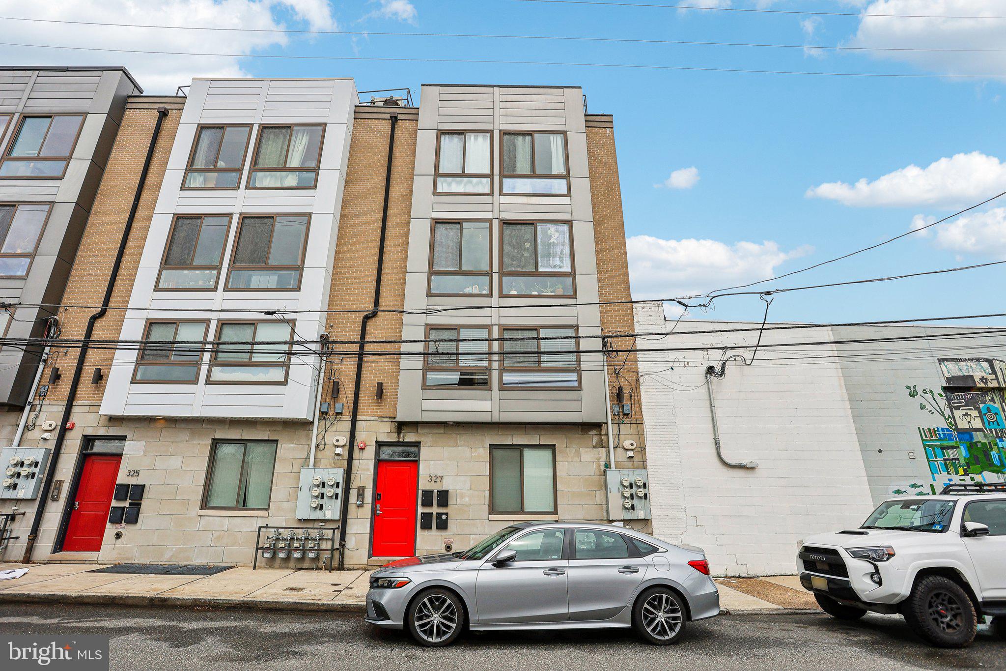 Discover contemporary city living in this stunning 2-bedroom, 2-bathroom condo, located in a boutique 4-unit building built in 2016. Spanning 1,500 square feet across three thoughtfully designed levels, this home combines modern elegance with unbeatable convenience. Ideally situated across from Penn Treaty Park and the Delaware River waterfront, you're also just moments from the Fishtown and Northern Liberties neighborhoods.
Inside, natural light pours through oversized windows, highlighting soaring ceilings and rich hardwood floors throughout. The top level features an open-concept layout with a spacious living room, dining area, and sleek modern kitchen—perfect for entertaining or everyday living. The Primary Bedroom includes a private ensuite bath, while the second bedroom and full bath are located on the main level for added ease. A dedicated laundry room enhances comfort and practicality.
Whether you're searching for your next home or a savvy investment, this stylish residence offers the ideal blend of space, design, and prime location in one of Philadelphia’s most sought-after areas.