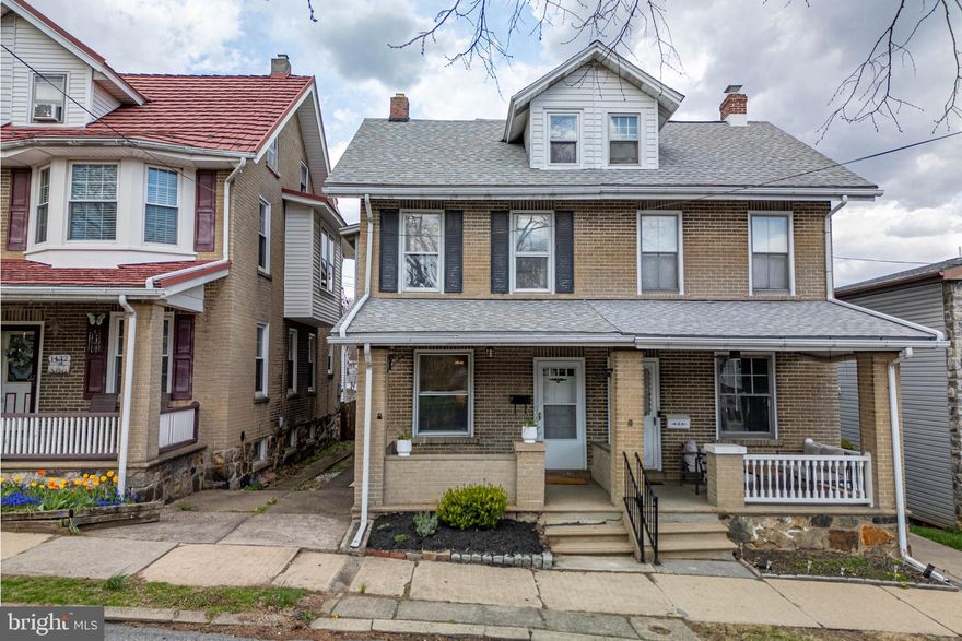 Welcome to your next chapter in Bethlehem! This lovingly maintained 3-bedroom twin with central AC offers a perfect blend of character, charm, and everyday comfort—all nestled in a location that puts you near parks, schools, shopping, and local favorites. Step onto the covered front porch, where morning coffee and quiet evenings await. Inside, you’re greeted by beautiful original hardwood floors that flow through the inviting living and dining room combo—a warm, open space perfect for gathering and making memories. The kitchen features stainless steel appliances and leads into a thoughtfully repurposed mudroom-turned-pantry, offering both style and function. Upstairs, you'll find three sunny bedrooms and a full bath, along with a walk-up attic for extra storage or a cozy tucked-away space for life’s extras. Step outside to enjoy your own covered back patio and a well-kept, fenced yard—a peaceful outdoor retreat perfect for relaxing, entertaining, or playtime. The detached garage adds parking convenience, and the attic loft above offers even more storage or potential for a hobby space or more, let your imagination run wild. The basement includes a convenient half bath, laundry area with a utility sink, space for your home gym, and additional storage. If you're dreaming of a home with soul, in a neighborhood that feels like home the moment you arrive—this is the one.