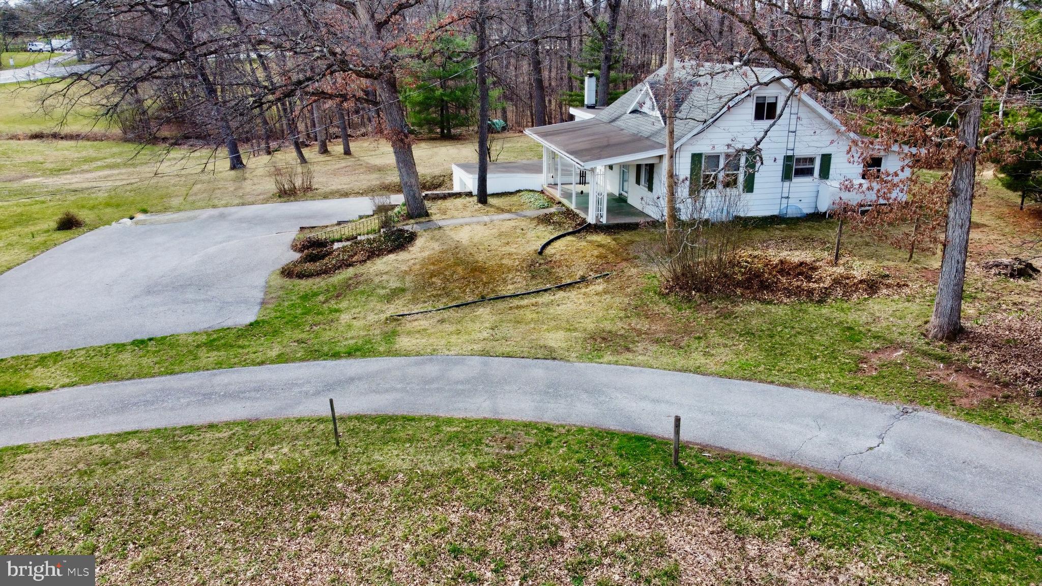 This charming Cape Cod home is situated within the Northern School District. It features two bedrooms on the first floor and a third bedroom with new flooring on the second floor. The kitchen has an electric range, dishwasher, refrigerator, and window unit a/c. There's a formal dining room that provides access to the upper level. The living room is cozy, and the full bathroom includes a tub/shower. The first-floor laundry area consists of the washer. The included Dryer is located on the Lower Level. You'll find plenty of storage space downstairs and a workshop room. The property consists of a one-car garage set on 1.54 acres in a picturesque setting.