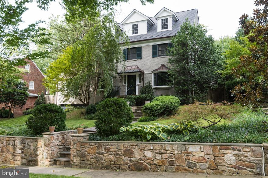 Expanded/Renovated 4 level colonial with 5BR/4.5BA w/ large flat rear garden. Expansive top line kit with lux great room w/cathedral ceilings, fireplace and glass doors w/access to garden & patio, traditional formal living room w/fireplace & doors to patio/garden, den, formal dining room w/bay window, MBR w/huge walk-in & marble MBR w/separate shower & tub. 1800 bottle wine rm and attached garage.