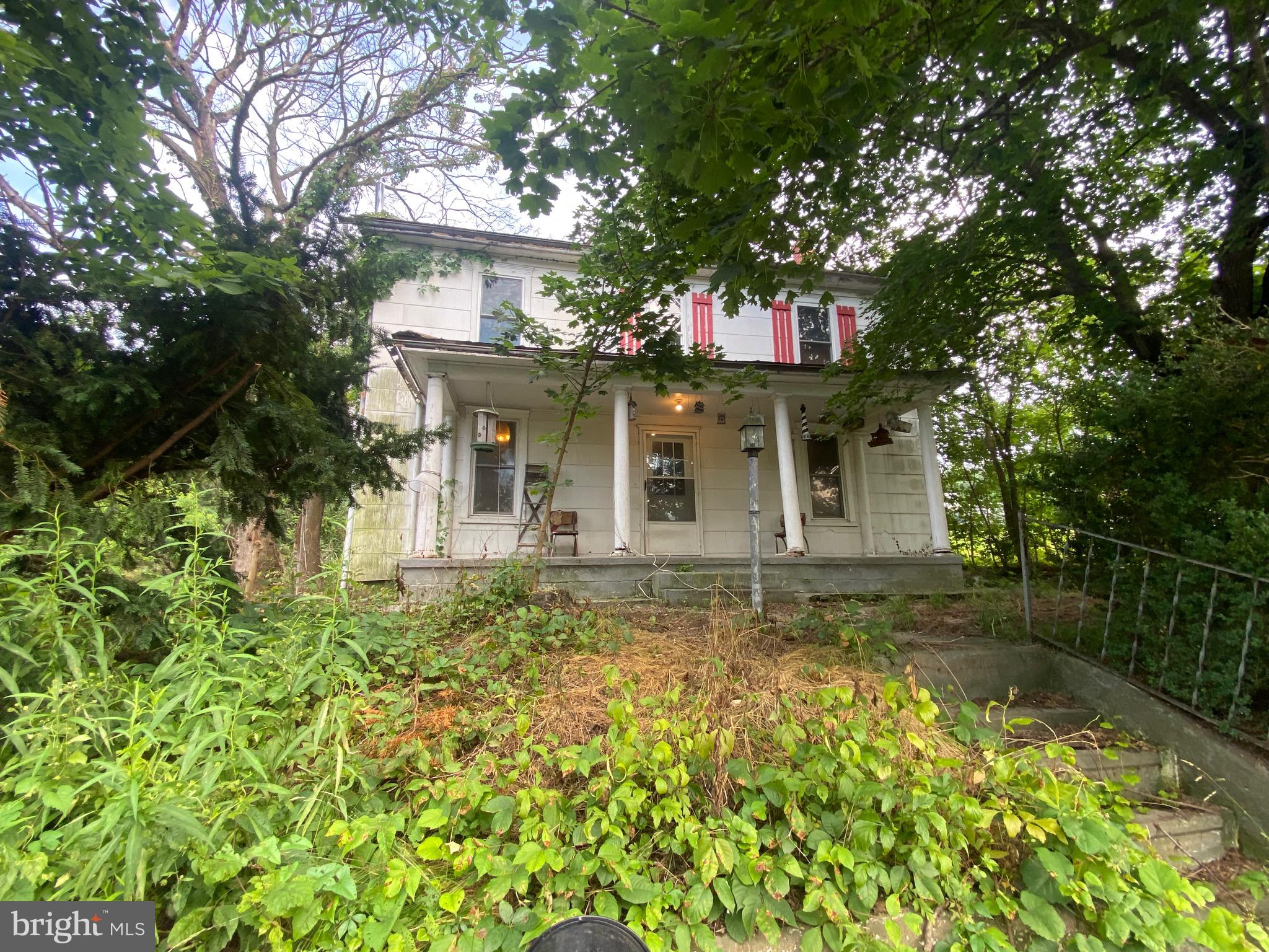 Excellent opportunity for any level investor, 3 separate lots with a total of 2.7 acres and 3 water/sewer hookups. The home is a complete tear down so this will be a cash or land sale.