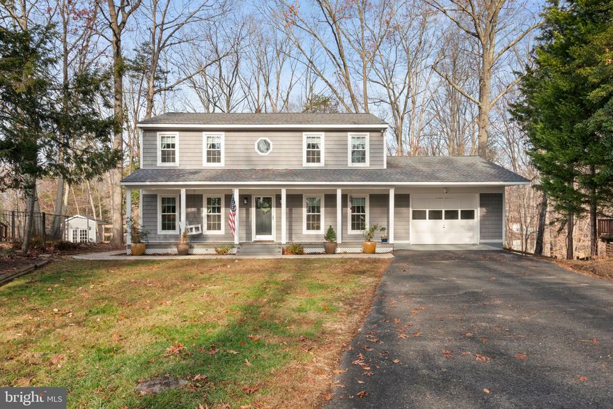 Welcome to 2006 Wave Drive! This beautiful colonial home is nestled in the highly sought-after Aquia Harbour community. The residence offers 3 bedrooms, 2.5 bathrooms, and 1,944 square feet of living space.

The open-concept kitchen boasts new cabinets, quartz countertops, stainless steel appliances, and a breakfast bar with additional storage. Adjacent to the kitchen is an oversized dining room, ideal for hosting gatherings. The spacious family room includes a niche perfect for an office or flex space. The primary suite features a newly designed bathroom and a walk-in closet, while two additional spacious bedrooms share an updated hall bath. The home is equipped with dual HVAC systems for optimal comfort. 

This charming home is situated on a 0.39-acre, flat, tree-filled, and fully fenced in lot. Offering privacy and tranquility. Enjoy your morning coffee on the front porch swing overlooking the lush front lawn, or entertain guests on the new wood deck with vinyl railings and light caps. Recent exterior upgrades include a new roof, shaker-style vinyl siding, vinyl-wrapped porch columns, new windows, and new front and back doors. 

Community Amenities: As a resident of Aquia Harbour, you’ll have access to a wealth of amenities, including a golf course, marina, stables, swimming pools, tennis courts, and walking trails. The community is conveniently located just minutes from major roadways, offering an easy commute north or south. 

The home is located less than 5 miles away from commuter lots, close to I-95, commutable to DC, Quantico, and Richmond. Don’t miss the opportunity to make 2006 Wave Drive your new home!

Roof: est. 2022
HVAC: 2022, 2023
Windows: 2022