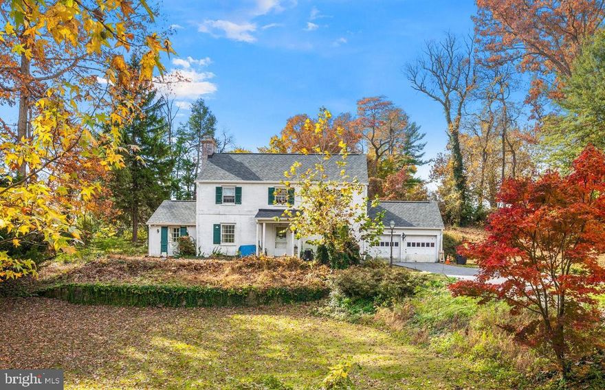 AMAZING OPPORTUNITY AND POTENTIAL.....all brick colonial nestled on a private .70 Acre lot in the heart of Ruxton. This home offers ample room to entertain indoors and outdoors is ready for its new owners to add their personal touches and modern amenities. Traditional floorplan with large living room with fireplace, formal dining room, den/study, sitting room and kitchen which connects the living space and has access to the rear-yard.  Four generously sized bedrooms, each with natural light and ample closet space with two full bathrooms on the second level.  Original hardwood floors and grand staircase are ready to be refinished. The large partially finished basement offers more living space with a recreation room, a half-bath, and storage/utility room. Over-sized attached two-car garage. Private backyard, you'll enjoy peaceful living with easy access to major commuting routes, shops, restaurants, parks, schools and much more. Brand new roof.