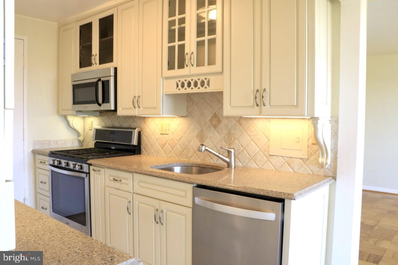 Welcome Home! Location, location, location. Beautiful two-bedroom; one-bathroom condominium in the sought after Grosvenor Community. Hardwood flooring throughout, gourmet kitchen, granite countertops. This home features a lovely sunlit open plan living and dining area leading to a balcony which showcases stunning views. The home also has two well-proportioned bedrooms and a modern luxury bathroom. The community includes on-site 24-hour concierge; on-site management; landscaped grounds; top floor party room; outdoor pool; fitness center; library; laundry and an outdoor grilling area. This fabulous home is close to restaurants at nearby Pike and Rose and Wildwood Shopping Center, as well as close to Whole Foods and the prestigious Strathmore Music Center. The Grosvenor-Strathmore Metro station (red-line) is within walking distance as is easy access to 270/495, NIH and Walter Reed. Condominium fee covers ALL utilities.