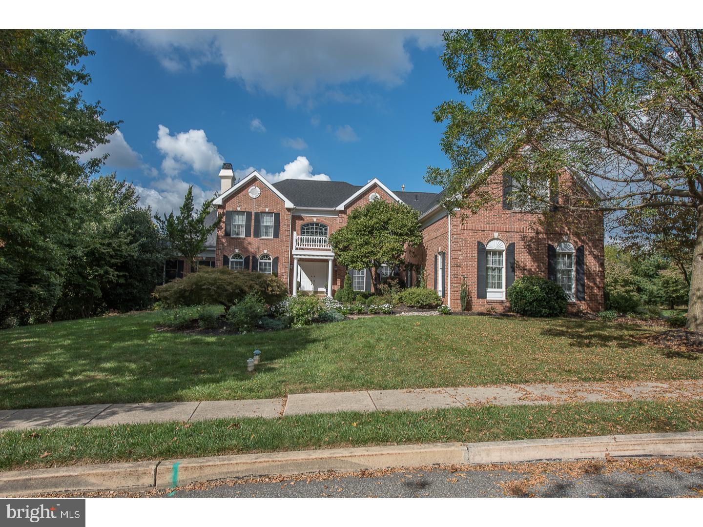 Elegant and magnificently appointed brick home in the Greens at Waynesborough. Nestled on almost an acre of professionally manicured and landscaped grounds with 15 acres of undeveloped land surrounding. The bright open floor plan has over 5000 sq ft of beautifully upgraded living space with extensive millwork and built in cabinetry throughout. The 2 story entrance has a retractable chandelier. The spacious dining room has a custom built in corner cabinet. From the living room with gas fireplace enter into the game room/office with built in cabinetry. The updated white kitchen with granite has high end appliances and an island with sink. There is a fabulous wet bar with custom cabinetry. The 2 story great room has a stone fireplace and coffered ceiling. From the Great Room enter into a sitting room/ office with built-in in custom cabinets.Back stairs lead to a beautiful landing overlooking the great room. On the 2nd floor the stunning master bedroom suite with cathedral ceiling offers, gas fireplace, 4 walk in closets, and marble master bath with shower and whirlpool tub. Two bedrooms share a Jack & Jill bathroom and the 4th bedroom has it's own full bath. 3 French doors with retractable screens open out to a large deck overlooking the grounds. 2119 Inverness offers plenty of upgrades and terrific features. From the gleaming hardwood floors to the elegant trim work to cathedral ceilings, to the open wooded level grounds and zoned lawn sprinkler system, the 3 car garage with vinyl floors, built in storage cabinets and potting sink, whole house generator,the Tredyffrin Easttown school district and close to all major commuting routes shops and transportation.