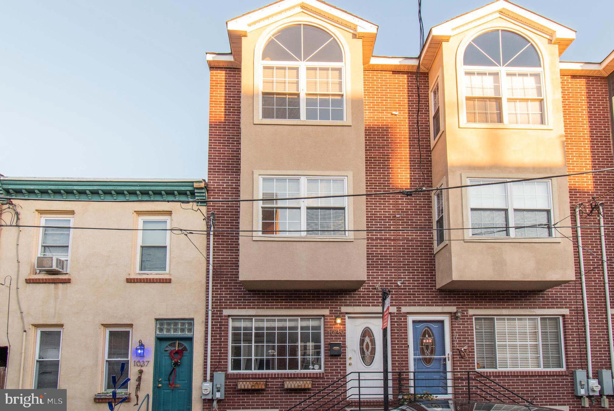 Beautiful Graduate Hospital location with spectacular views of the entire city and easy access to major roads and public transportation. This 3 bedroom home welcomes you with oak hardwood floors throughout and casement windows. 1st level offers an open floor plan with living and dining rooms and kitchen with stainless steel appliances, granite countertops, traveline backsplash and kitchen island. 2nd level consists of 2 bedrooms and full bath. 3rd level has a gorgeous master suite with walk-in closet, master bath and private balcony with staircase leading to the rooftop deck with electric and cable hookup. Fully finished basement with brand new carpet, has a powder room, and laundry room with plenty of storage. Enjoy a private patio backyard for relaxing or entertaining.