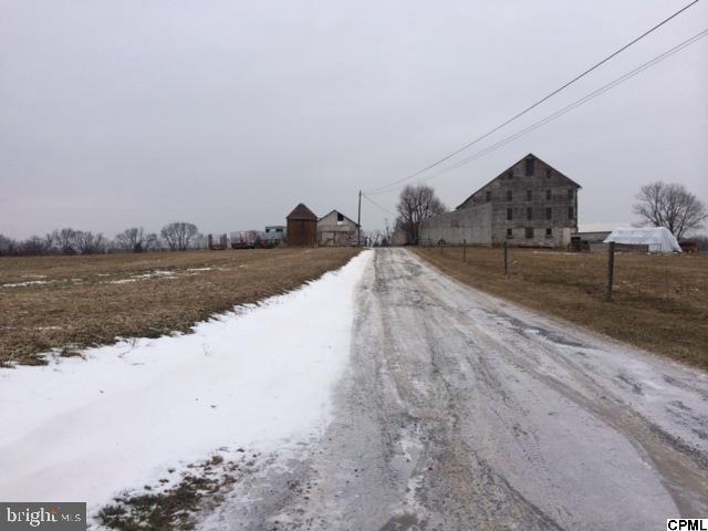 80 acres zoned light Industrial w/ 4BR farm house and large barn (both currently rented). Land is farmed every year by a local farmer and is in clean and green. A beautiful parcel next to a large warehouse to the East and car dealership to the North. Approximately 10 acres have stream and wetlands. Some uses; Manufacturing, Processing, packaging, wholesaling of food, storage, offices, vocational schools. Township approval. MLS#10263718 for x-ref in Commercial.