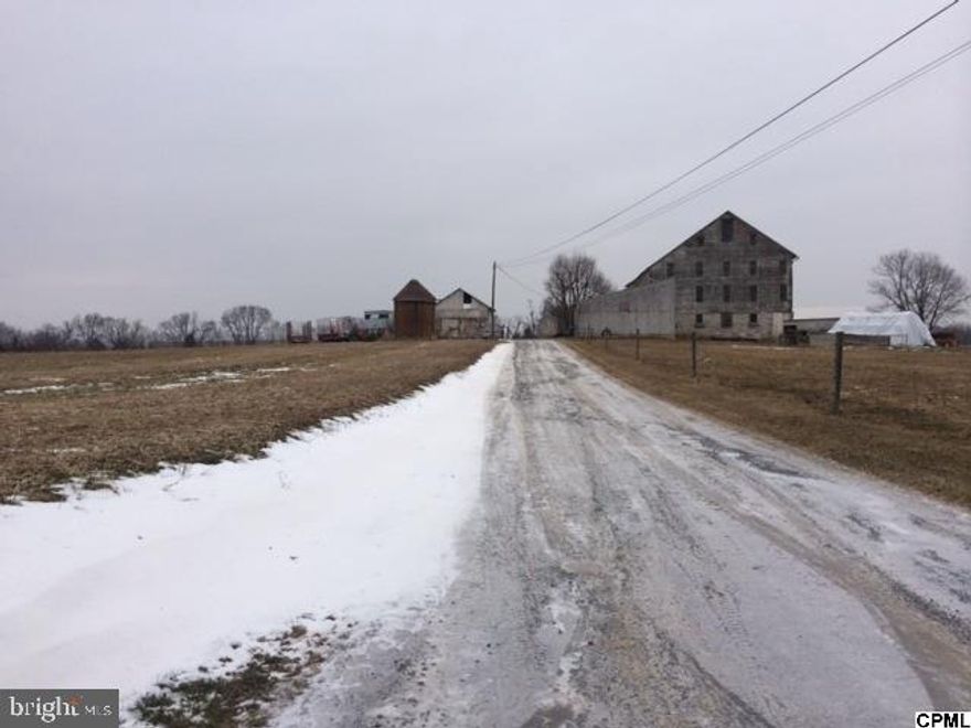 80 acres zoned light Industrial w/ 4BR farm house and large barn (both currently rented). Land is farmed every year by a local farmer and is in clean and green. A beautiful parcel next to a large warehouse to the East and car dealership to the North. Approximately 10 acres have stream and wetlands. Some uses; Manufacturing, Processing, packaging, wholesaling of food, storage, offices, vocational schools. Township approval.  MLS#10263718 for x-ref in Commercial.