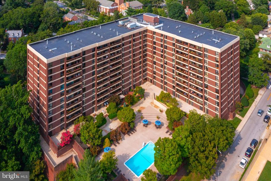 Come visit this lovely freshly-painted condominium home with hardwood flooring (not parquet) and an open floor plan. Bedrooms are carpeted.  This unit has two bedrooms, two baths and AMAZING VIEWS from your balcony…all the way to the water! Enjoy a modern kitchen with tile flooring and under-cabinet lighting. Two sets of replaced sliders, and a sweet  view from your east-facing balcony. This home is also equipped with a front loading stacking washer/dryer combo, assigned deeded parking space, and storage locker. Condo fee includes heat, hot water, central A/C, building maintenance & more (excludes Wi-Fi and cable). Winthrop House amenities: 24/7 doorman & concierge, on-site maintenance & property manager, outdoor pool & fitness center, sauna, meeting/party room, guest suite for visitors, and then location, location, location! Just a short walk to Johns Hopkins University, the Baltimore Museum of Art, Gertrude’s Restaurant, Sherwood Gardens, and countless local cafes, shops, and amenities. Don’t miss this rare opportunity to live in one of Baltimore’s most convenient and charming neighborhoods—with all the perks of a full-service building. 
This building is renowned for being well-managed with high reserve funds. The balconies are resurfaced and refurbished. The roof and elevators were recently replaced here. There is no anticipated special assessment. Ask the listing agent about this fantastic building. His Mom lives here! Love living here!