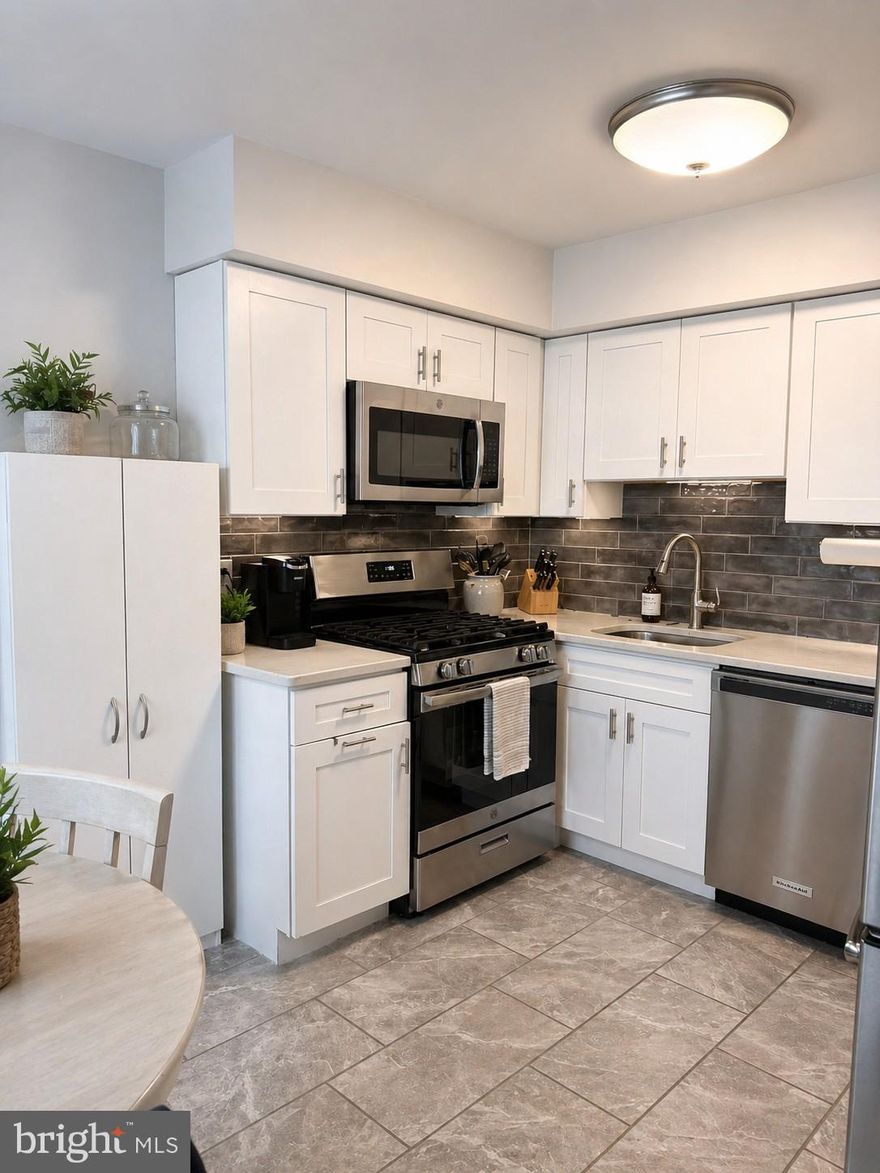 Professional photos will be uploaded once received- Home is drop dead gorgeous & needs NOTHING!
Simple living at its finest!! This stunning 2 bedroom, 1/1 bath bumped out for extra sunlight home is the one you have been waiting for!! Enter into the living room boasting tasteful hardwood flooring, deep windowsills,  & a pretty banister leading upstairs. The open kitchen/dining area has grey tile flooring, white shaker cabinets with corian counter tops, a pretty tile backsplash, deep sink with detachable faucet, stainless appliances, a gas range,  and farmhouse style light fixture. Off of the living room you will find a conveniently located half bath & laundry room with tile flooring, updated brushed nickel light fixture, & white vanity. Laundry room has shelving over units for extra storage. Upstairs you will find a deep, spacious hall linen closet, 2 spacious bedrooms & your totally renovated full bathroom. Full bath with tile flooring, large expresso vanity, over the toilet cabinet, tub with tile surround including a tasteful accent band, pretty mirror & brush nickel fixtures. Primary bedroom is a very generous size with deep window sills, a ceiling fan/light combo and TWO closets- one being a walk in! The 2nd bedroom also offers a ceiling fan/light combo & a very deep, semi walk-in closet. Next you will find the perfectly finished basement with chair rail, a beautiful accent wall with built in shelving, & ceiling fan/light combo. This space is perfect for entertaining!! There is also the perfect sized storage room for that extra stuff everyone has laying around! This home has been very lovingly maintained & it shows!! Don't wait on this one!!!