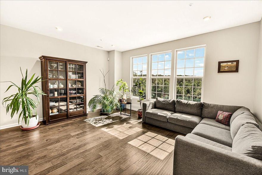 Welcome to this stunning end-unit townhome at a premium location in the sought-after Cabin Branch community. Boasting panoramic forest views, modern finishes, and light-filled open spaces, this home offers the perfect blend of luxury and coziness. Entertain guests in the spacious gourmet kitchen equipped with center island, granite countertops, and 2023 KitchenAid oven+dishwasher—or enjoy a quiet cup of coffee on your private balcony.

Upstairs, you'll find three well-appointed bedrooms, including a tray-ceiling primary suite with a spa-like ensuite bath complete with dual granite-topped vanities. A full hall bath and laundry room with 2023 LG washer+dryer offer ample sunlight and convenience on the upper level.

Additional features include an Ecobee smart thermostat, Guardian security system, Google Nest doorbell, U-Bolt smart lock, one-car garage complete with EV charger, and an exclusive parking lot for the building.


Step outside and enjoy a walkable neighborhood surrounded by the natural beauty of Black Hills and Seneca Regional Parks—and Clarksburg Premium Outlets just around the corner. Cabin Branch offers a one-of-a-kind experience with swimming pools, a clubhouse, picnic pavilions, and even an on-site elementary school. Don't miss your chance to live in Clarksburg's premier community!